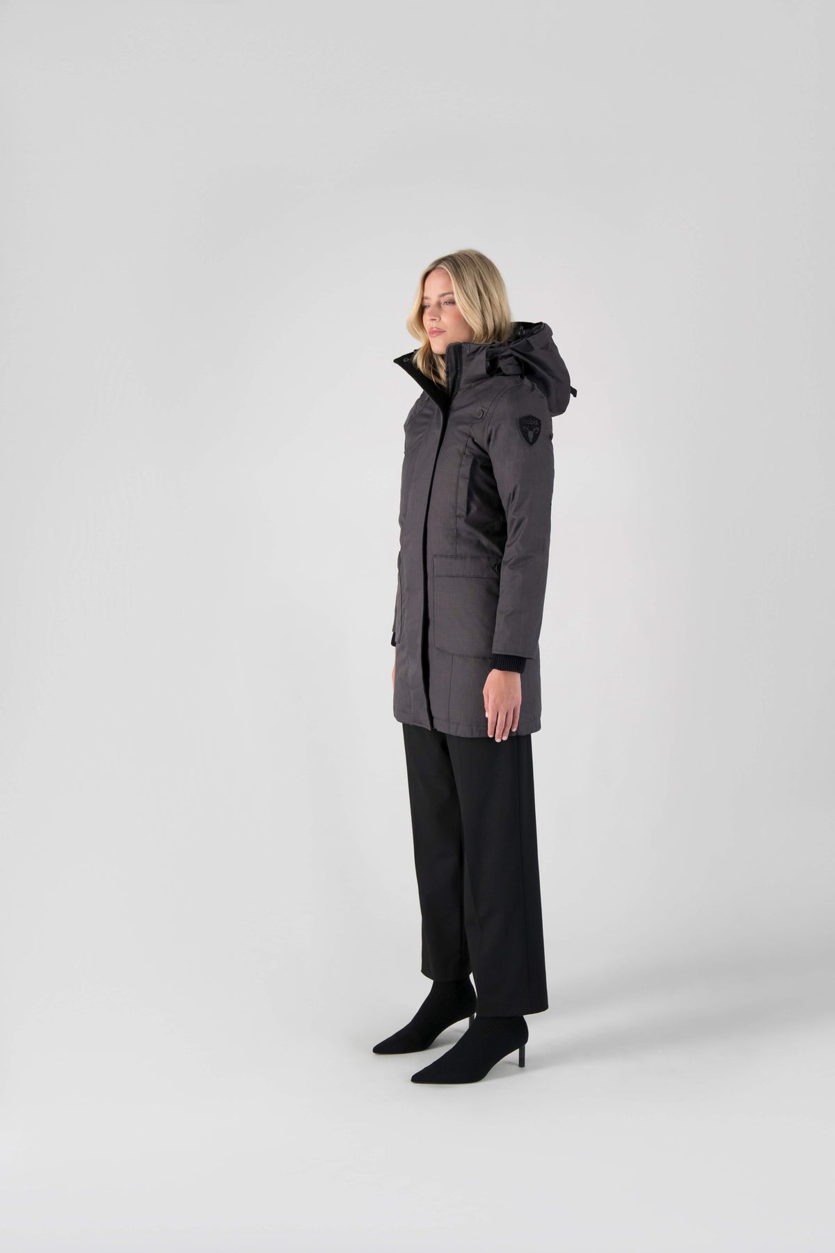 Best selling women's down filled knee length parka with removable down filled hood in Steel Grey