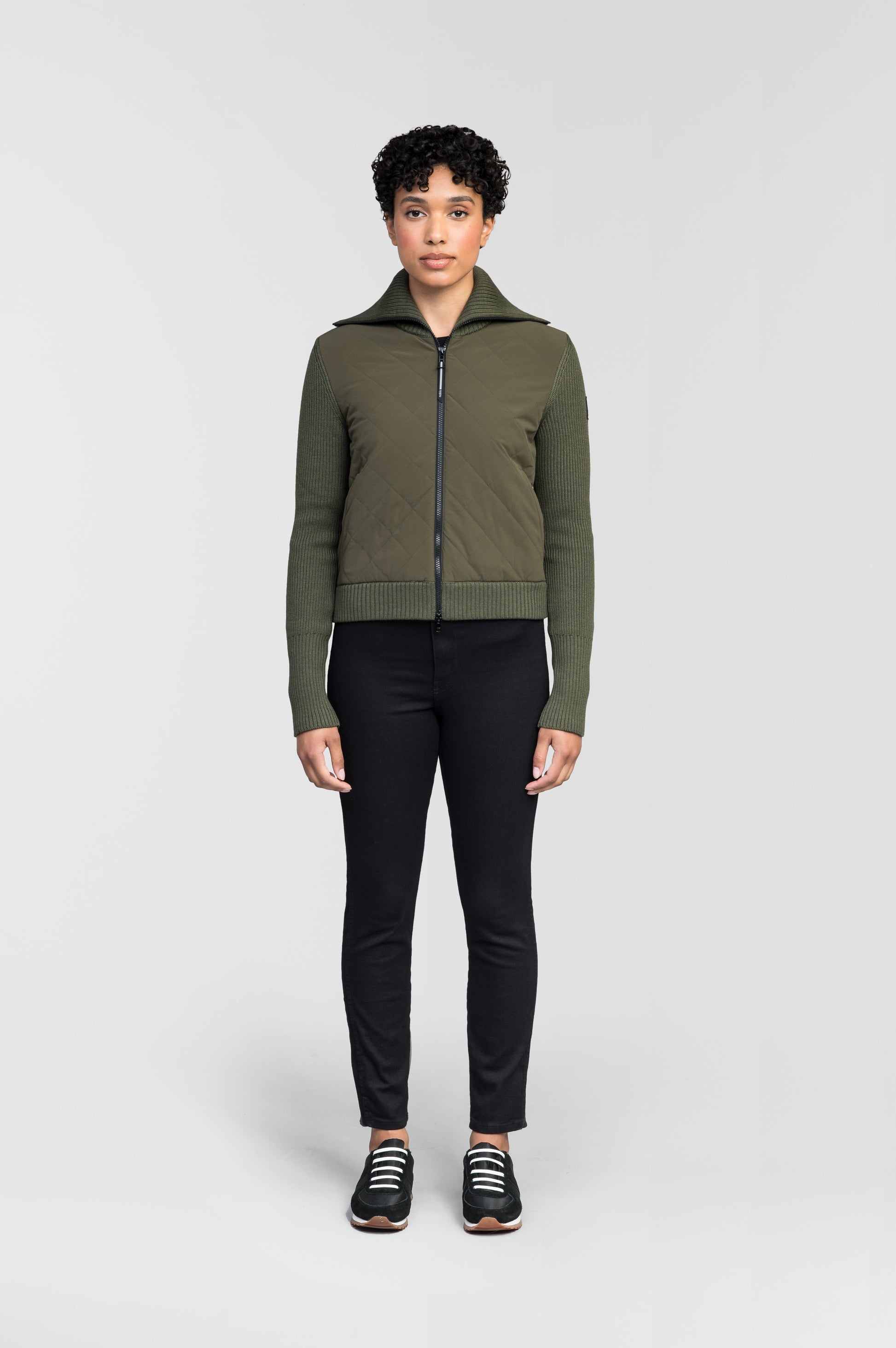 Ada Ladies Quilted Full Zip Sweater in hip length, PrimaLoft Gold Insulation Active+, Durable 4-Way Stretch Weave quilted torso, Merino wool knit collar, sleeves, back, and cuffs, two-way front zipper, and hidden waist pockets, in Fatigue