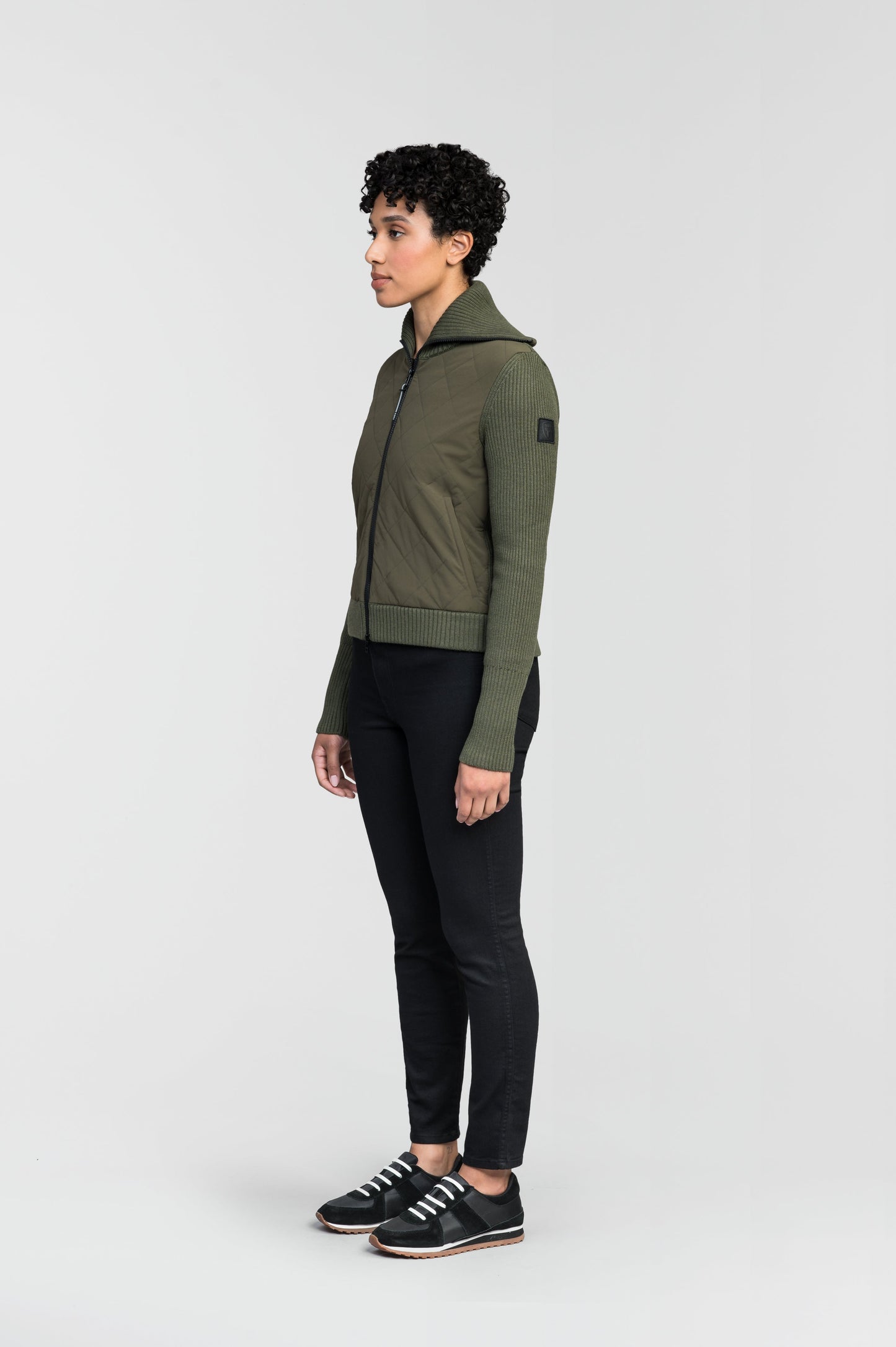 Ada Ladies Quilted Full Zip Sweater in hip length, PrimaLoft Gold Insulation Active+, Durable 4-Way Stretch Weave quilted torso, Merino wool knit collar, sleeves, back, and cuffs, two-way front zipper, and hidden waist pockets, in Fatigue