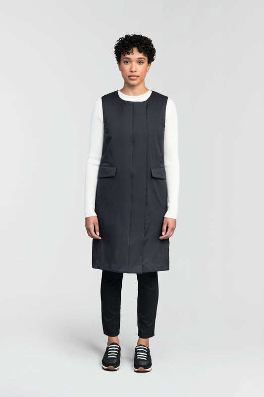 Brexton Women's Tailored Long Mid Layer Vest in knee length, centre front wind flap, flap closure waist pocket with additional side entry storage, single vent on back bottom hem, in Black + Black / S