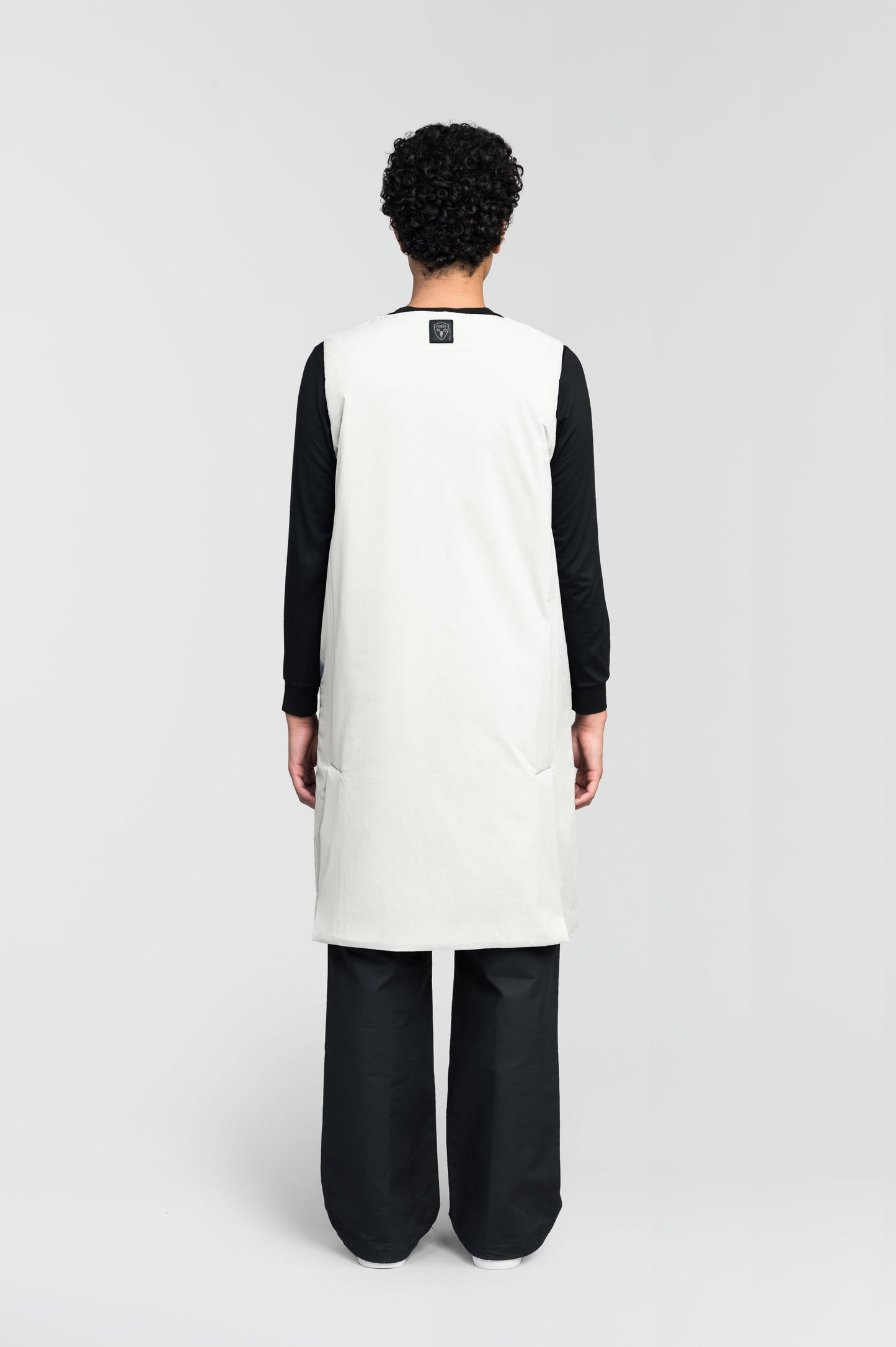 Brexton Women's Tailored Long Mid Layer Vest in knee length, centre front wind flap, flap closure waist pocket with additional side entry storage, single vent on back bottom hem, in Chalk