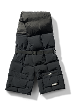 Chroma Unisex Oversized Puffer Scarf in stretch ripstop and taffeta nylon in a quilted pattern, Canadian White Duck Down insulation, cobra buckle belt with webbing strap, and large zipper pocket at scarf end, in Black