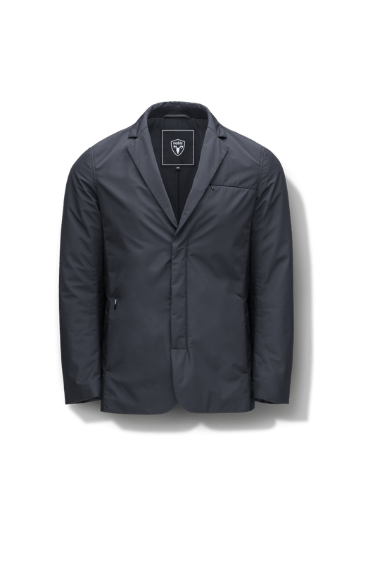 Cody Men's Tailored Travel Blazer in 3-ply micro denier and stretch nylon fabrication with DWR coating, Primaloft Gold Insulation Active+, hidden two-way zipper at centre front with snap closure placket, three invisible exterior zipper pockets, double back pleats, and hidden snap placket at cuffs, in Black + Black