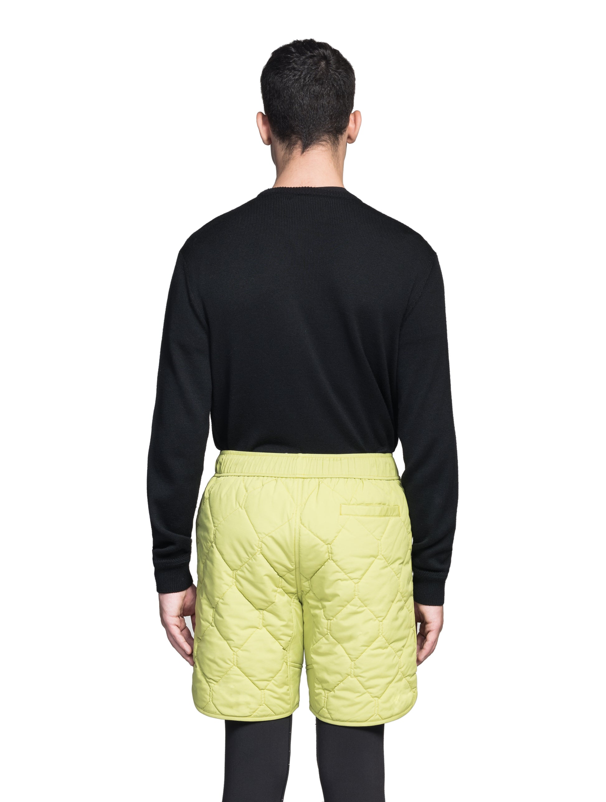Curt Men's Performance Quilted Shorts at knee length, premium stretch nylon and stretch ripstop fabricaiton, premium 4-way stretch, water resistant Primaloft Gold Insulation Active+, side seam pockets, exteriror back pocket, elasticized waist with drawcords, and notch detailing at side seams, in Dark Citron