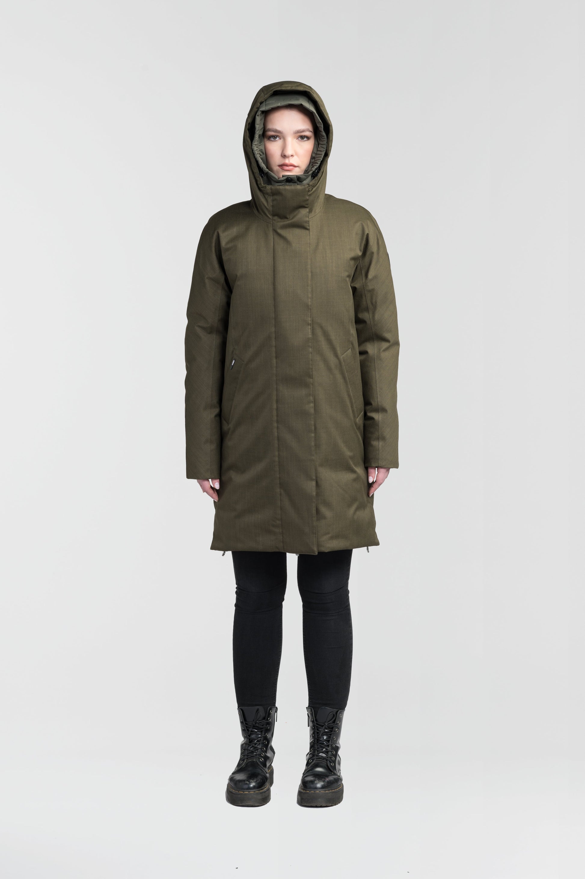 Dory Women's Tailored Back Zip Parka in knee length, premium Crosshatch fabrication, Premium Canadian White Duck Down insulation, non-removable down-filled hood, removable interior hood, centre front two-way zipper with wind flap, vertical zipper detailing along back, in Fatigue