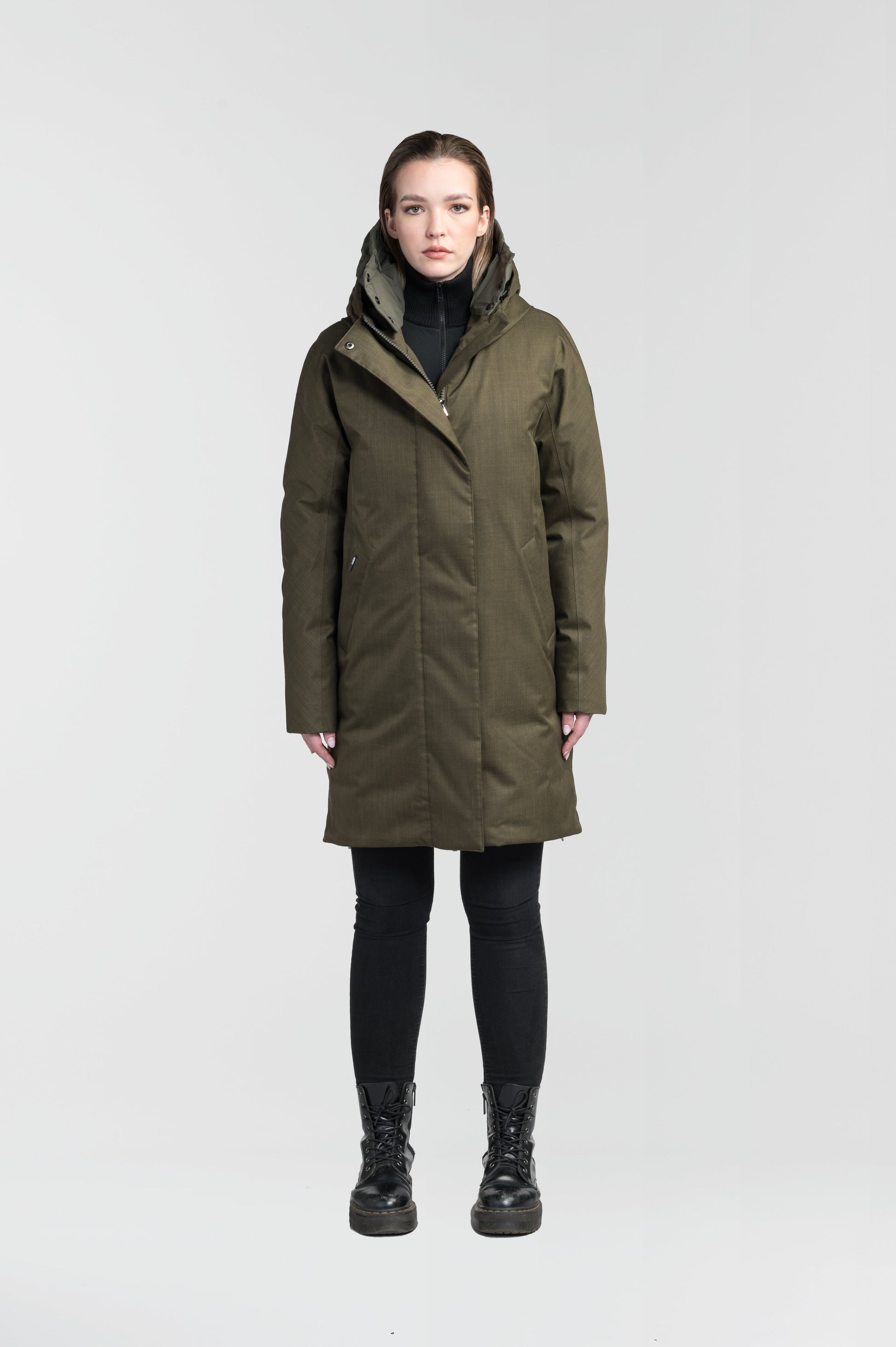 Dory Women's Tailored Back Zip Parka in knee length, premium Crosshatch fabrication, Premium Canadian White Duck Down insulation, non-removable down-filled hood, removable interior hood, centre front two-way zipper with wind flap, vertical zipper detailing along back, in Fatigue