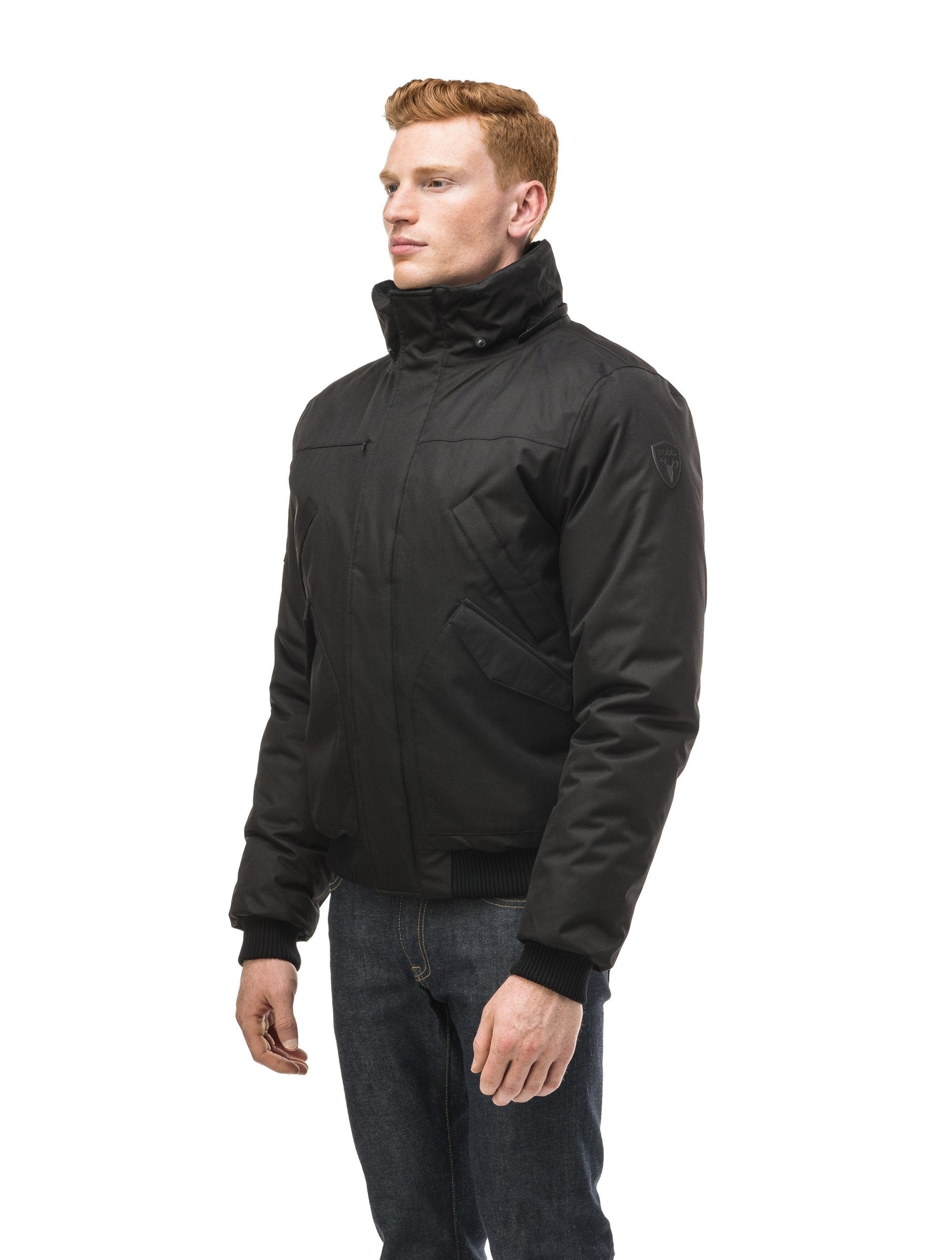 Men's classic down filled bomber jacket with a down filledÃƒÆ’Ã†â€™Ãƒâ€ Ã¢â‚¬â„¢ÃƒÆ’Ã¢â‚¬Â ÃƒÂ¢Ã¢â€šÂ¬Ã¢â€žÂ¢ÃƒÆ’Ã†â€™Ãƒâ€šÃ‚Â¢ÃƒÆ’Ã‚Â¢ÃƒÂ¢Ã¢â€šÂ¬Ã…Â¡Ãƒâ€šÃ‚Â¬ÃƒÆ’Ã¢â‚¬Â¦Ãƒâ€šÃ‚Â¡ÃƒÆ’Ã†â€™Ãƒâ€ Ã¢â‚¬â„¢ÃƒÆ’Ã‚Â¢ÃƒÂ¢Ã¢â‚¬Å¡Ã‚Â¬Ãƒâ€¦Ã‚Â¡ÃƒÆ’Ã†â€™ÃƒÂ¢Ã¢â€šÂ¬Ã…Â¡ÃƒÆ’Ã¢â‚¬Å¡Ãƒâ€šÃ‚Â hood that features a removable coyote fur trim and concealed moldable framing wire in Black