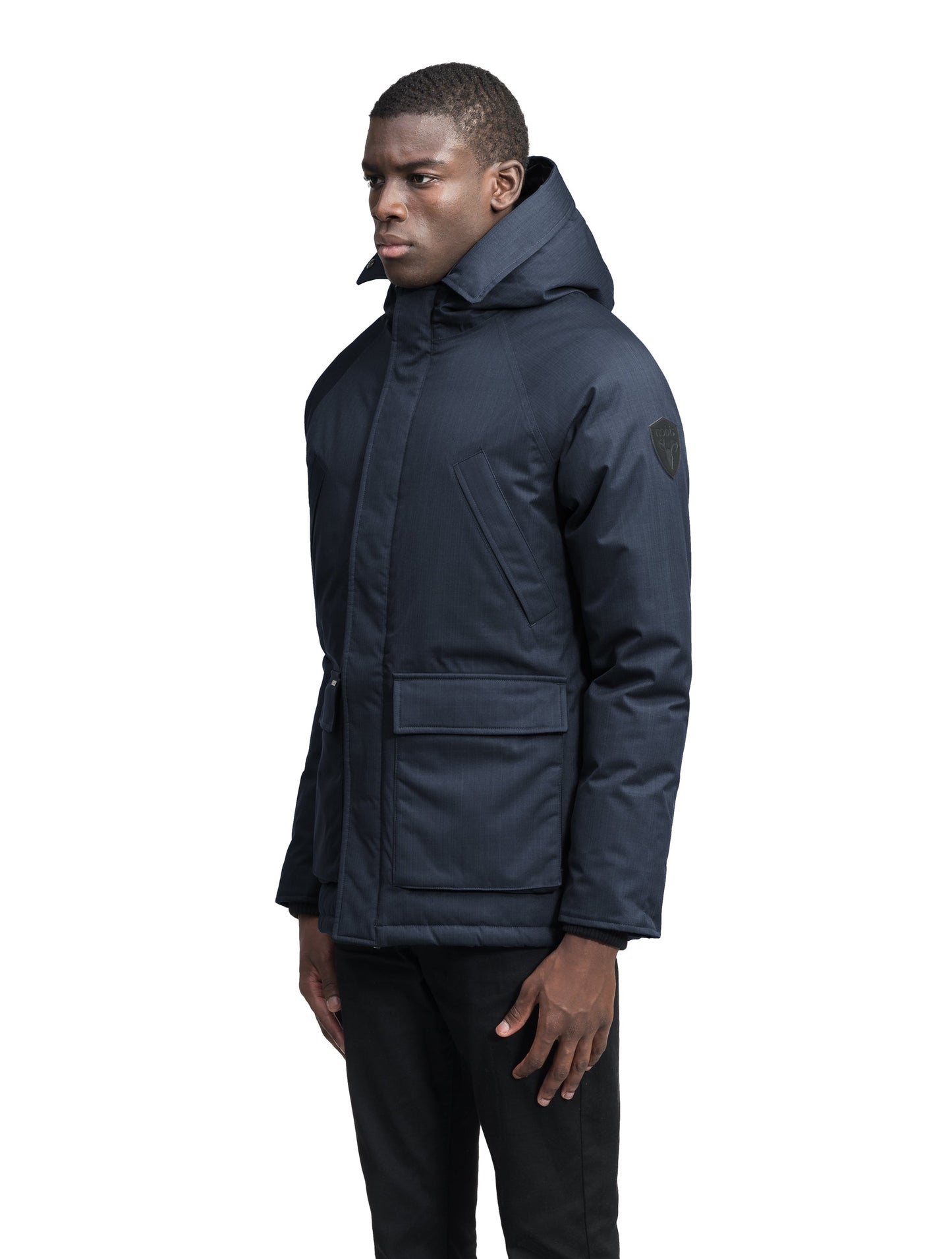 Heritage Furless Men's Parka in hip length, Canadian white duck down insulation, non-removable hood, front zipper with magnetic placket, chest hand warmer pockets, waist flap pockets, and elastic cuffs, in Navy