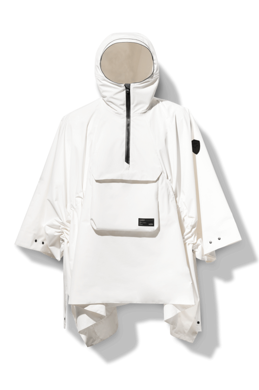 Hydra Unisex Performance Poncho in thigh length, non-removable hood, vertical half-zipper along centre front collar, hidden side-entry waist zipper pockets, adjustable webbing straps and snap closure cuffs, and packable to front kangaroo pocket with flap opening, in Chalk + Chalk