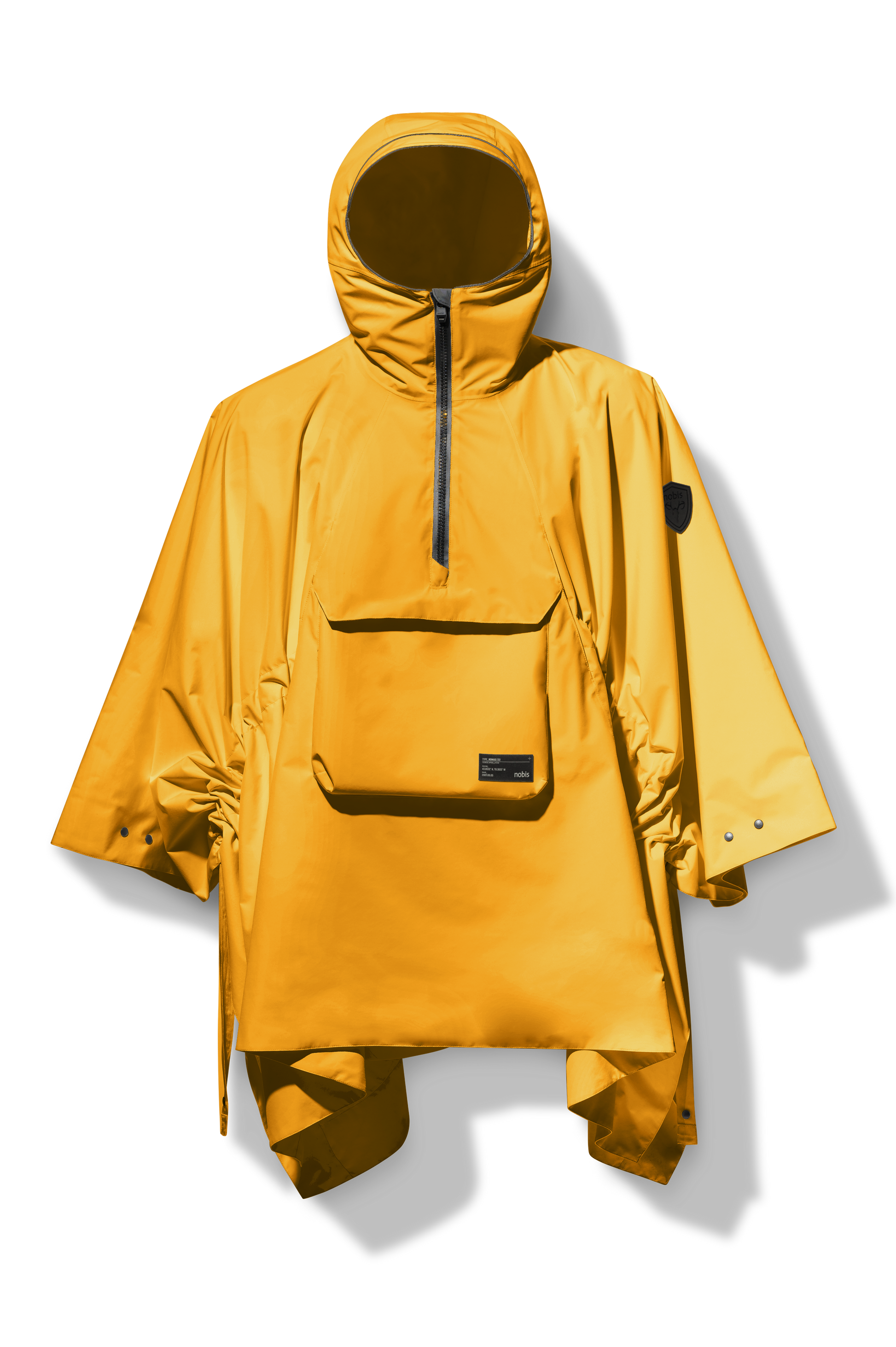 Hydra Unisex Performance Poncho in thigh length, non-removable hood, vertical half-zipper along centre front collar, hidden side-entry waist zipper pockets, adjustable webbing straps and snap closure cuffs, and packable to front kangaroo pocket with flap opening, in Old Gold