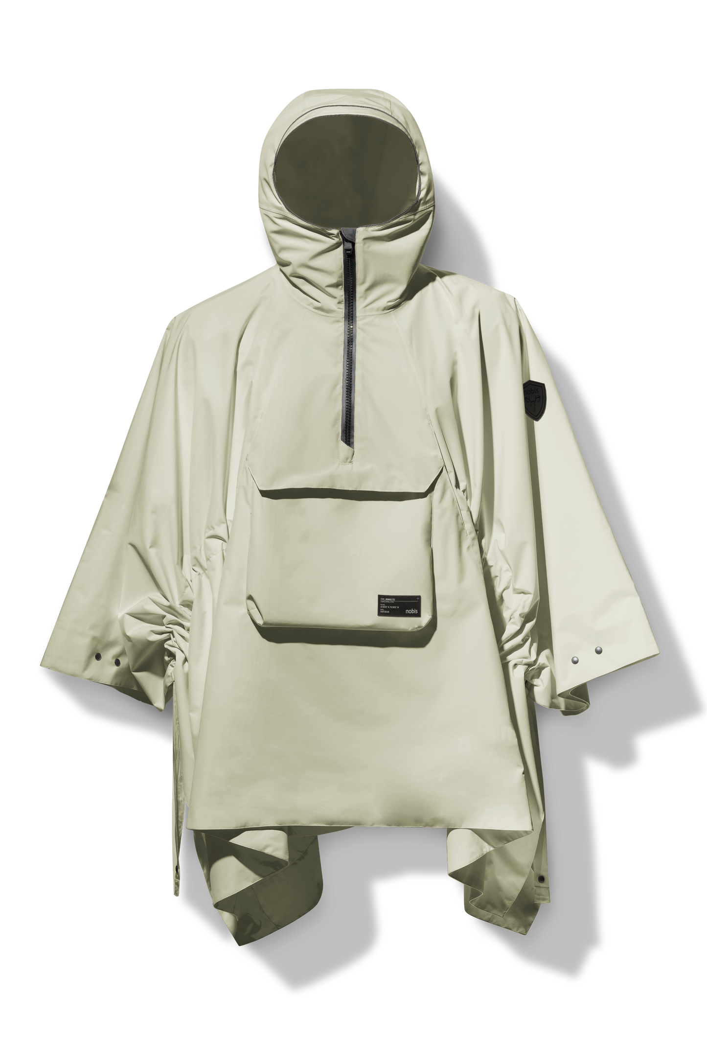 Hydra Unisex Performance Poncho in thigh length, non-removable hood, vertical half-zipper along centre front collar, hidden side-entry waist zipper pockets, adjustable webbing straps and snap closure cuffs, and packable to front kangaroo pocket with flap opening, in Tea