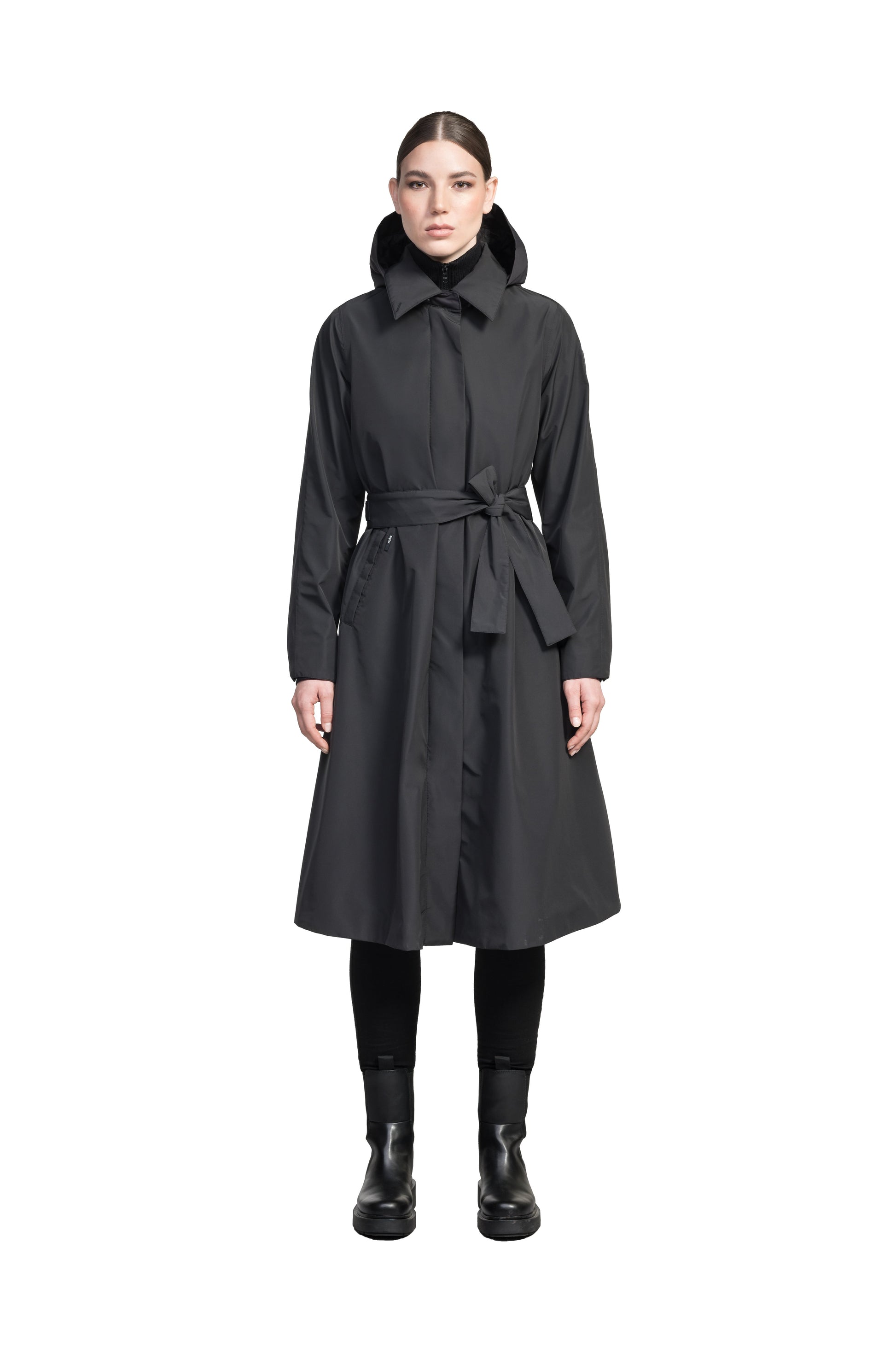 Ivy Ladies Tailored Trench Coat in knee length, 3-Ply Micro Denier fabrication, retractable non-removable hood, front wind flap with snap button closure, removable belt, and adjustable snap cuffs, in Black