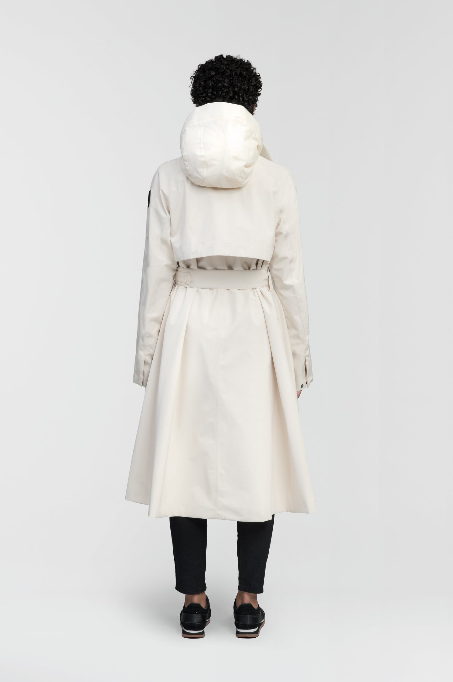 Ivy Ladies Tailored Trench Coat in knee length, 3-Ply Micro Denier fabrication, retractable non-removable hood, front wind flap with snap button closure, removable belt, and adjustable snap cuffs, in Wheat