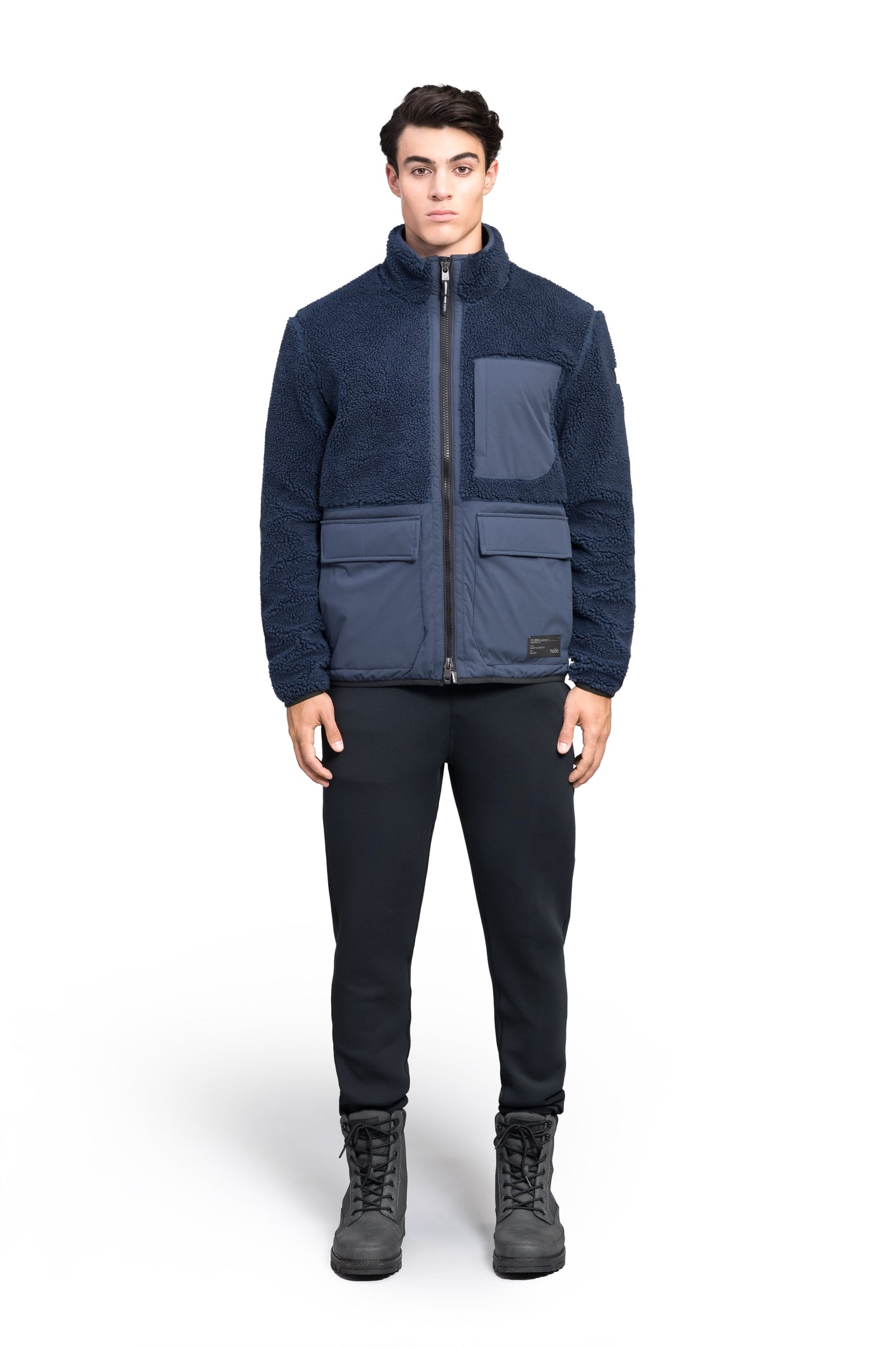 Kepler Men's Berber Zip Front Sweater in hip length, premium berber and stretch ripstop fabrication, Primaloft Gold Insulation Active+, two-way centre-front zipper, zipper pocket at left chest, magnetic closure flap pockets at waist with additional side-entry pockets, in Marine