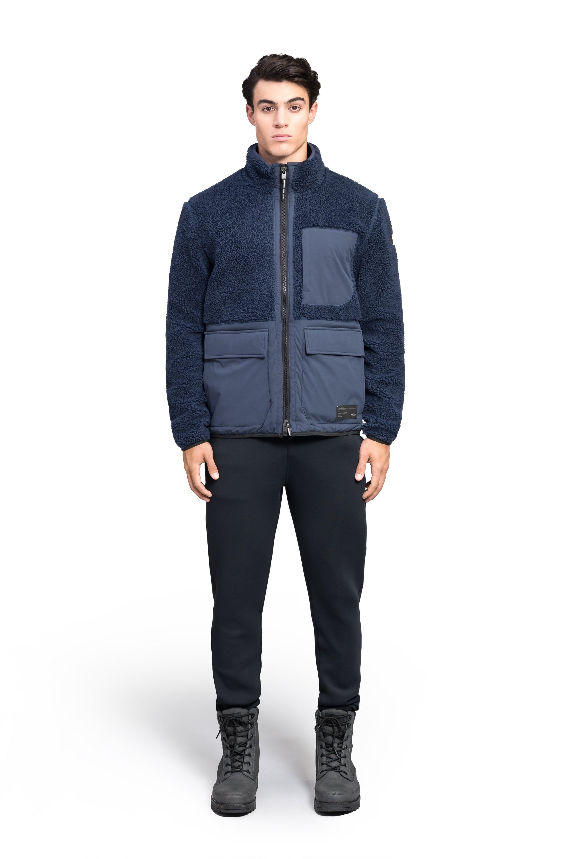 Kepler Men's Berber Zip Front Sweater in hip length, premium berber and stretch ripstop fabrication, Primaloft Gold Insulation Active+, two-way centre-front zipper, zipper pocket at left chest, magnetic closure flap pockets at waist with additional side-entry pockets, in Marine