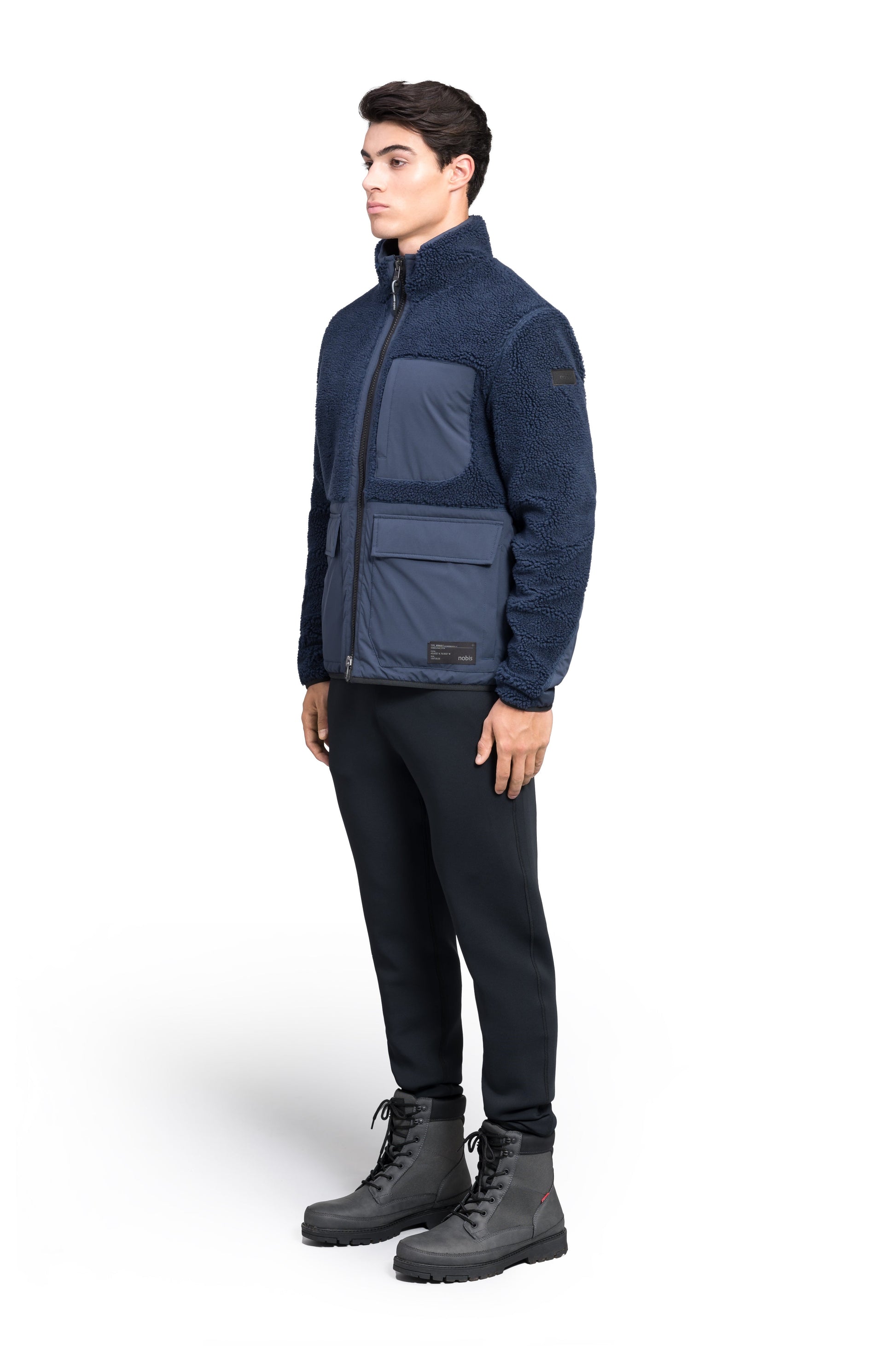 Kepler Men's Berber Zip Front Sweater in hip length, premium berber and stretch ripstop fabrication, Primaloft Gold Insulation Active+, two-way centre-front zipper, zipper pocket at left chest, magnetic closure flap pockets at waist with additional side-entry pockets, in Marine