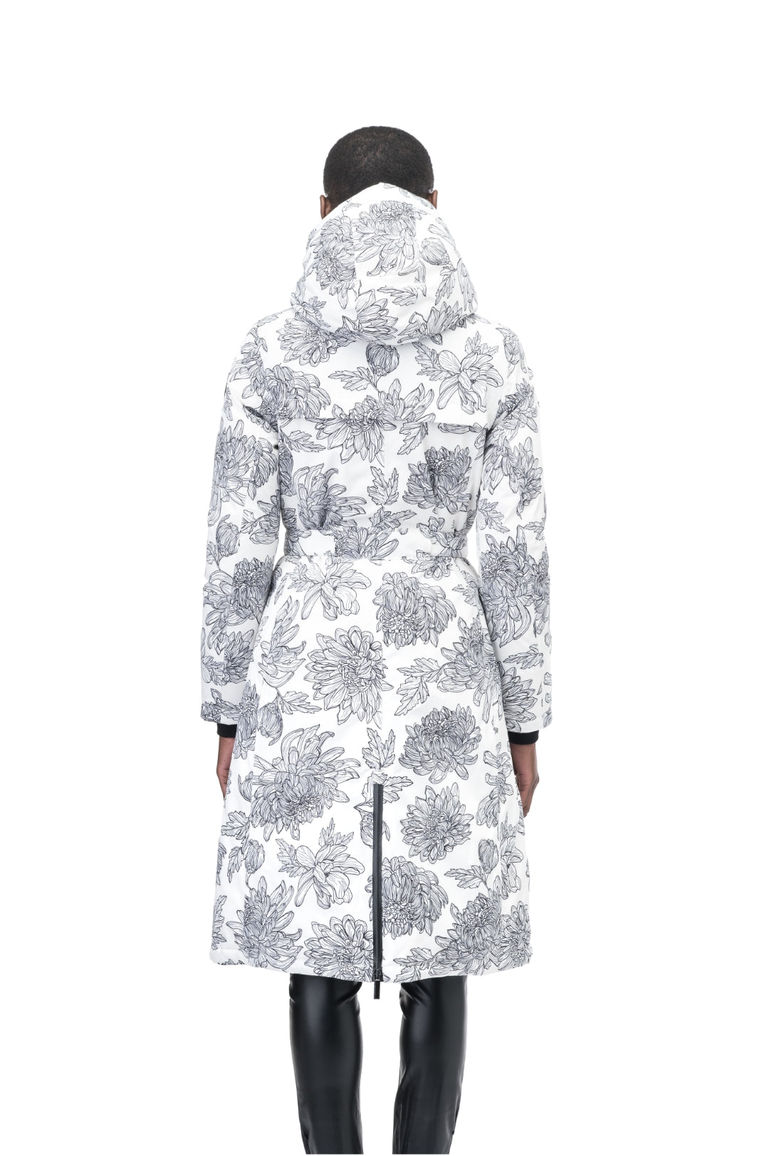Long calf length hooded women's winter parka with an inner hip length closure, exterior hem length zipper and magnetic placket in White Floral