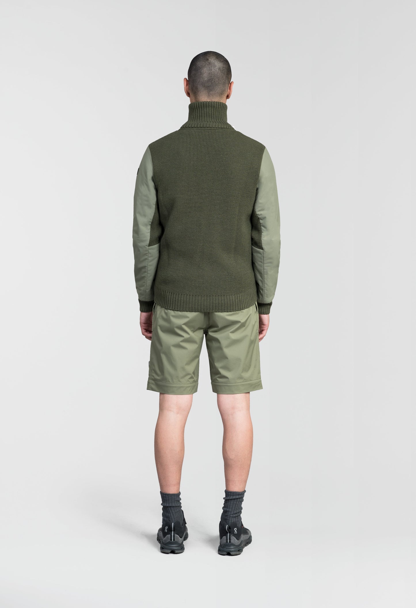 Layton Men's Tactical Hybrid Sweater in hip length, Primaloft Gold Insulation Active+, Merion wool knit collar, sleeves, back, and cuffs, two-way front zipper, and pockets at chest and waist, in Clover