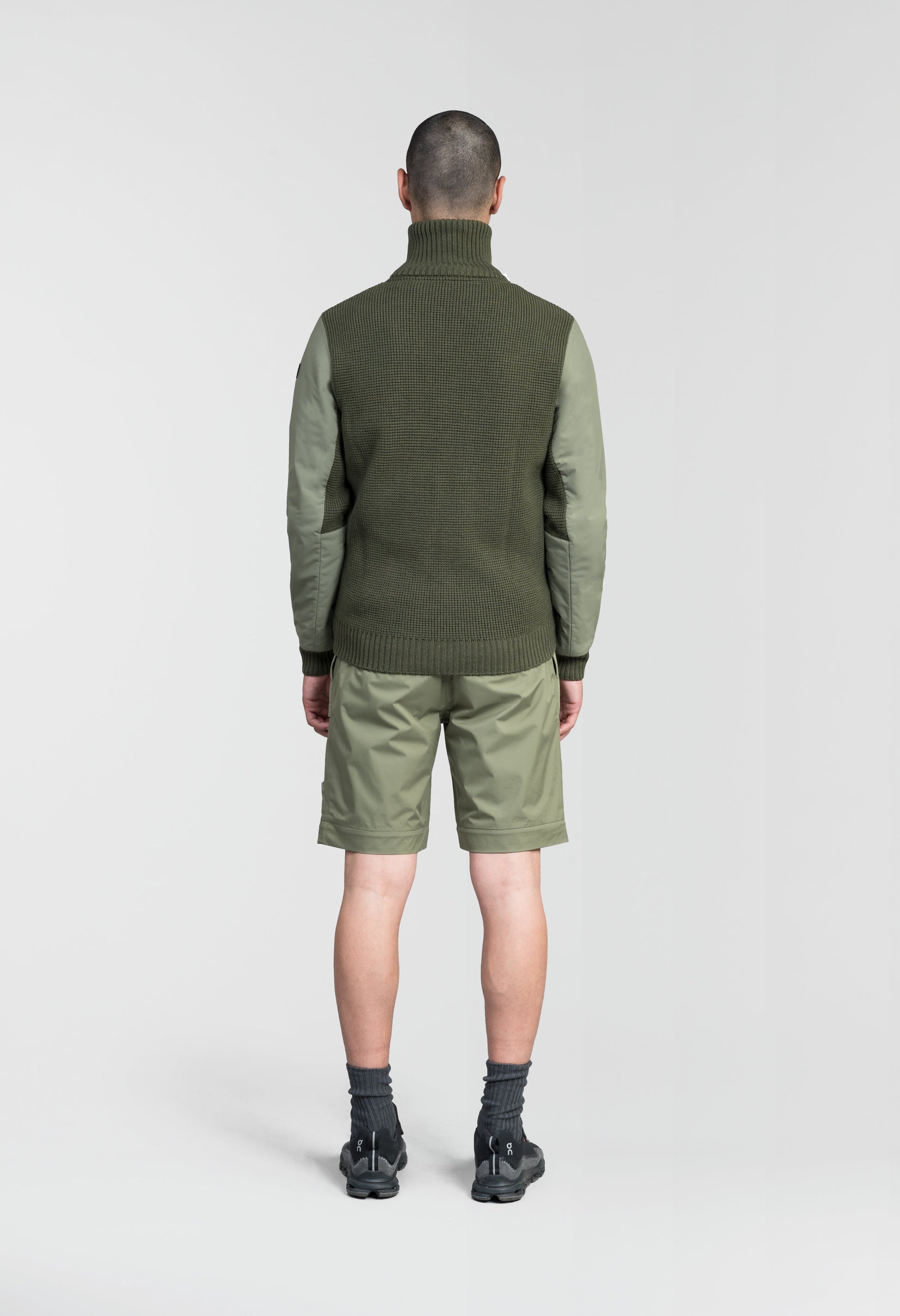 Layton Men's Tactical Hybrid Sweater in hip length, Primaloft Gold Insulation Active+, Merion wool knit collar, sleeves, back, and cuffs, two-way front zipper, and pockets at chest and waist, in Clover