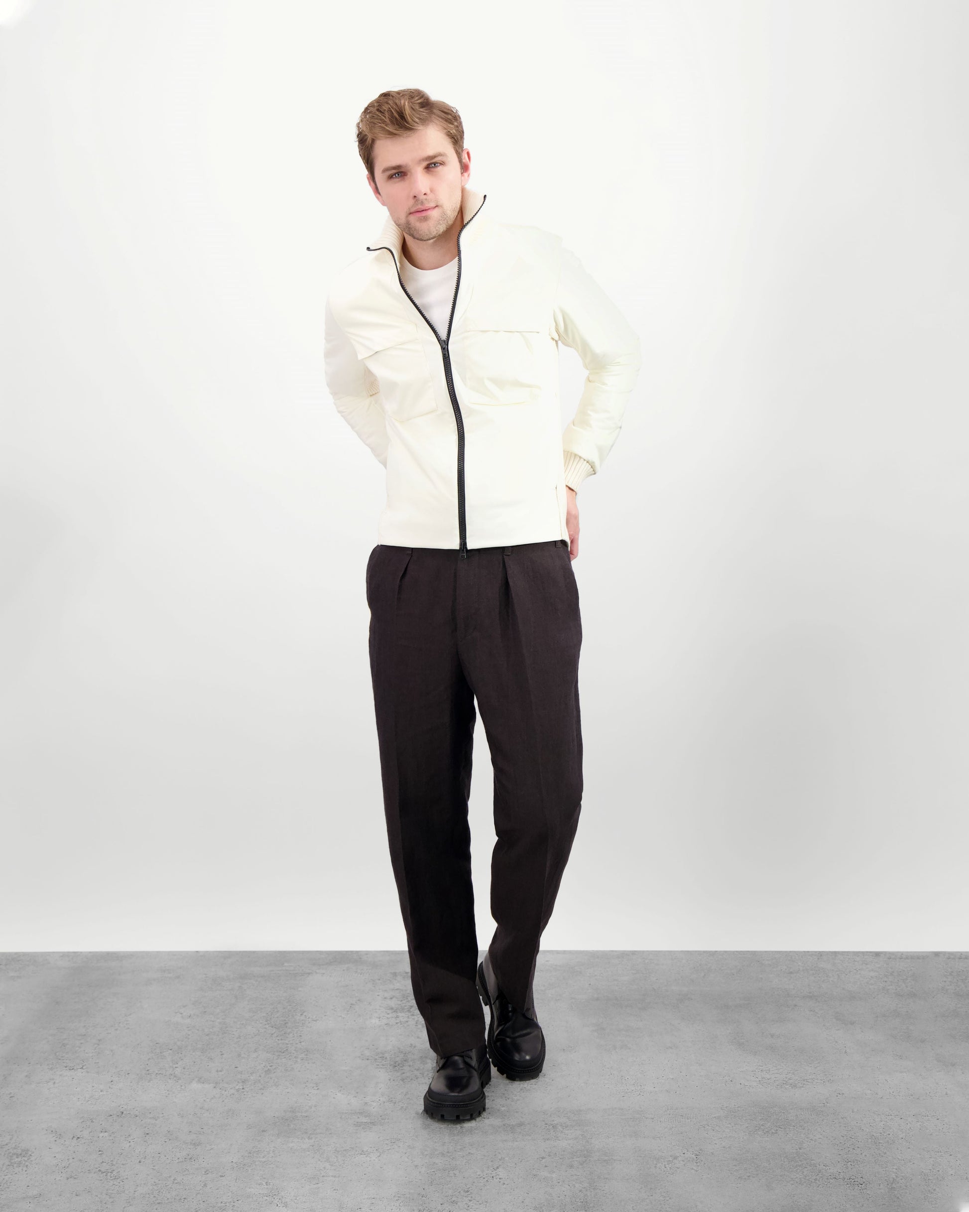 Layton Men's Tactical Hybrid Sweater in hip length, Primaloft Gold Insulation Active+, Merion wool knit collar, sleeves, back, and cuffs, two-way front zipper, and pockets at chest and waist, in Chalk