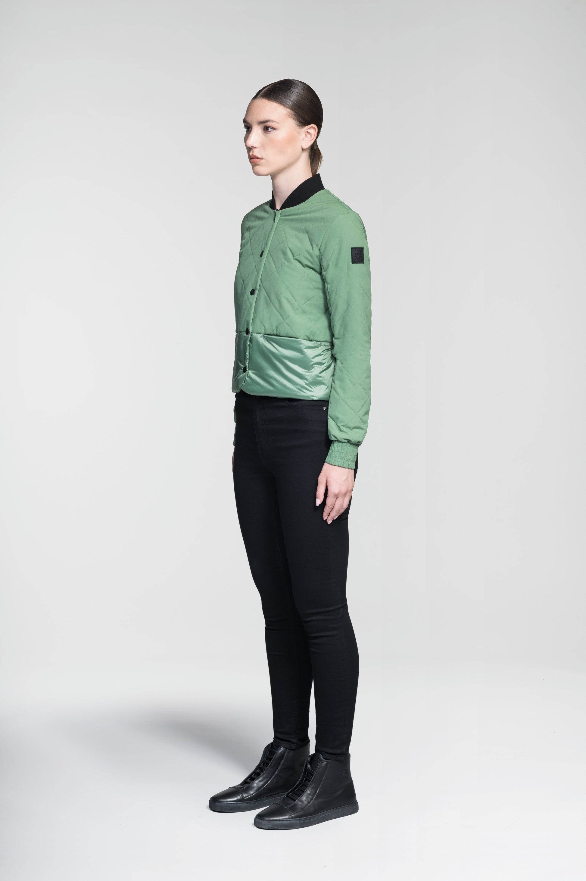 Lexi Women's Reversible Midlayer Jacket in waist length, premium stretch ripstop and contrast cire technical nylon taffeta fabrication, premium 4-way stretch, water resistant Primaloft Gold Insulation Active+, snap button closure at centre front, exterior magnetic closure pockets at sides, elasticized cuff details, and reversible from a quilted or smooth outer shell, in Comfrey