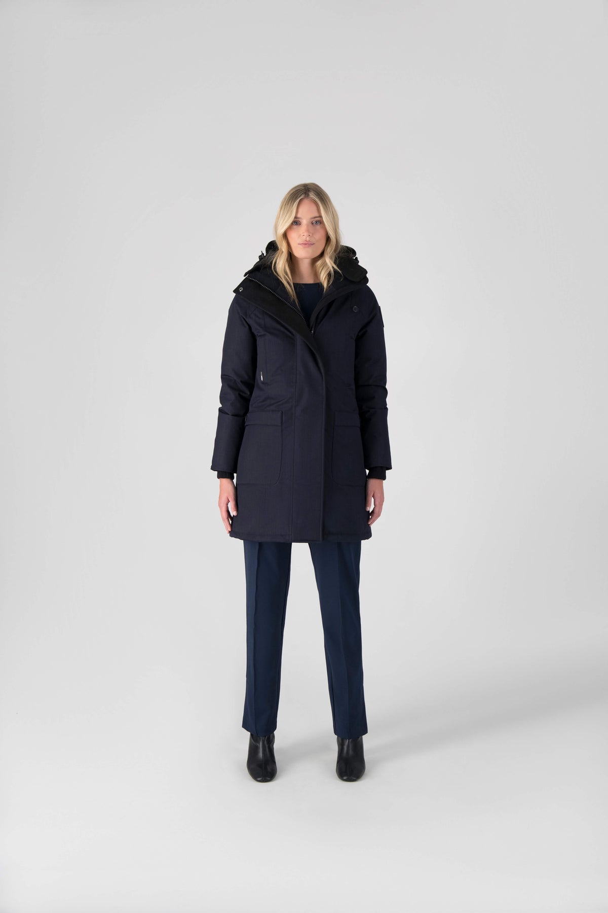 Best selling women's down filled knee length parka with removable down filled hood in Navy