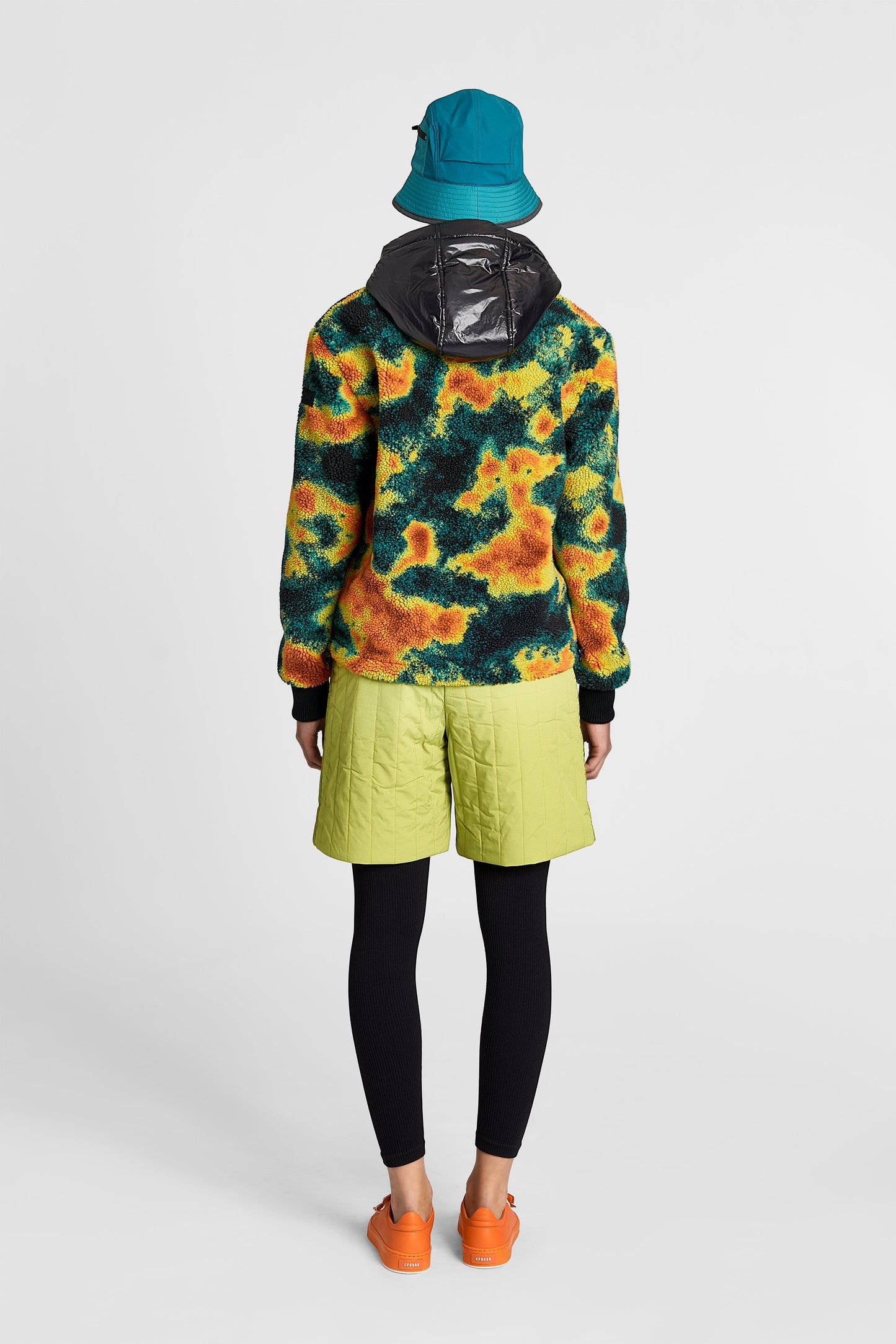 Roche Women's Hybrid Berber Pullover Hoodie in hip length, premium berber and cire technical nylon taffeta fabrication, Primaloft Gold Insulation Active+, non-removable hood with zipper at collar, kangaroo pocket with magnetic closure flap and additional side-entry pockets, ribbed cuffs, adjustable drawcords at side hem, in Heat Map