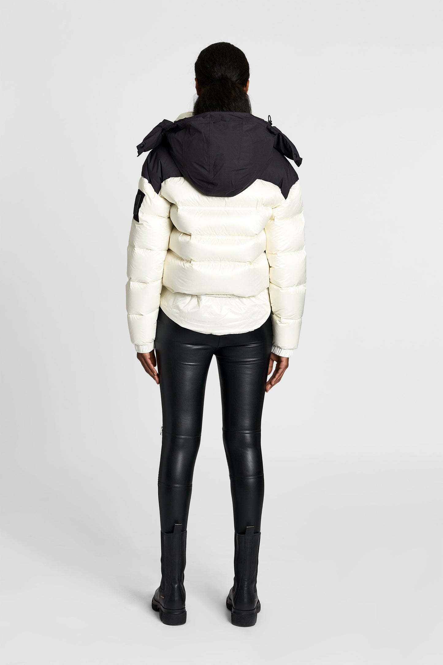 Tempus Women's Performance Short Puffer Jacket in waist length, premium technical nylon taffeta fabrication, Premium Canadian origin White Duck Down insulation, removable down-filled hood, two-way centre-front zipper, fleece-lined zipper pockets at waist, pit zipper vents, in Chalk