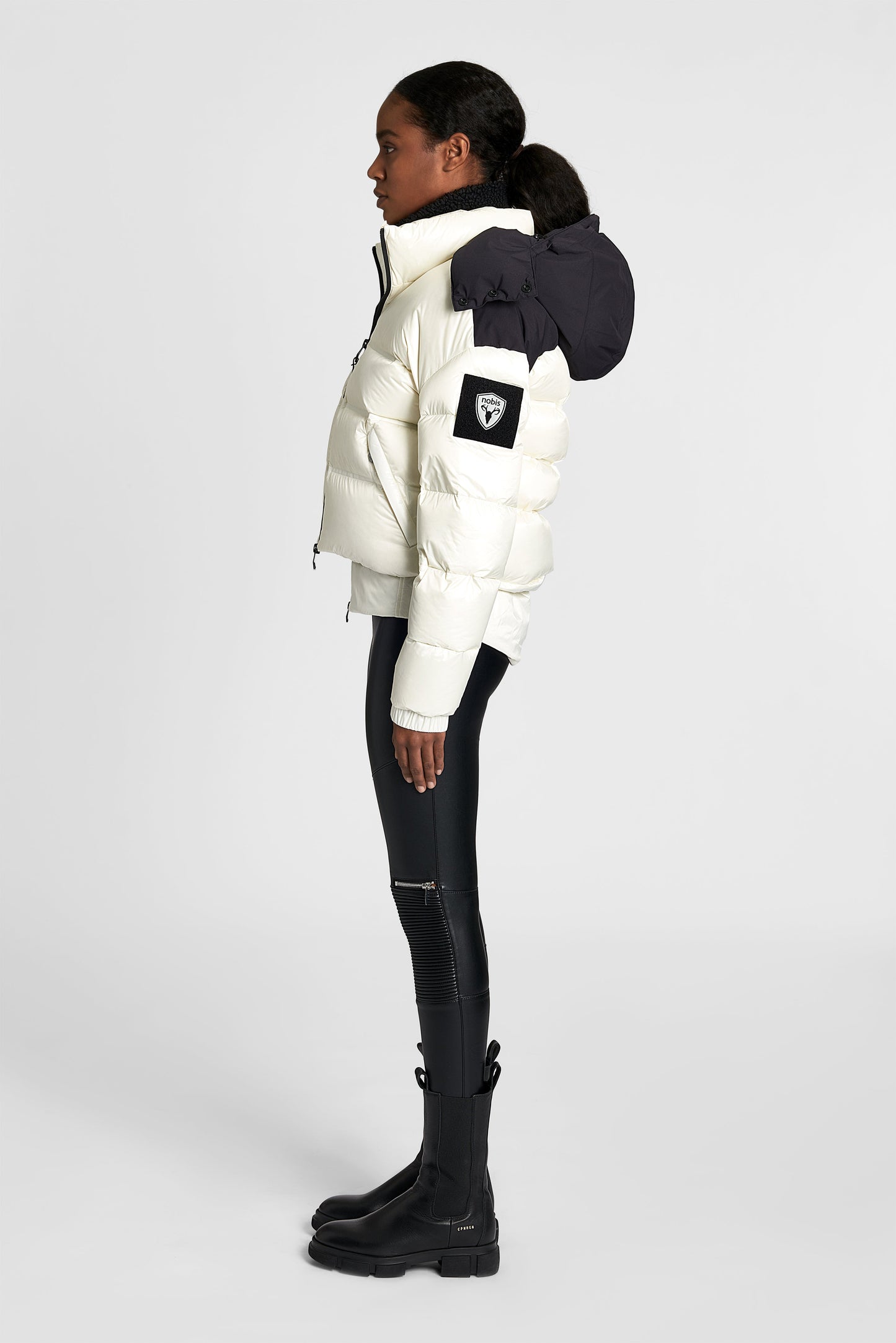 Tempus Women's Performance Short Puffer Jacket in waist length, premium technical nylon taffeta fabrication, Premium Canadian origin White Duck Down insulation, removable down-filled hood, two-way centre-front zipper, fleece-lined zipper pockets at waist, pit zipper vents, in Chalk