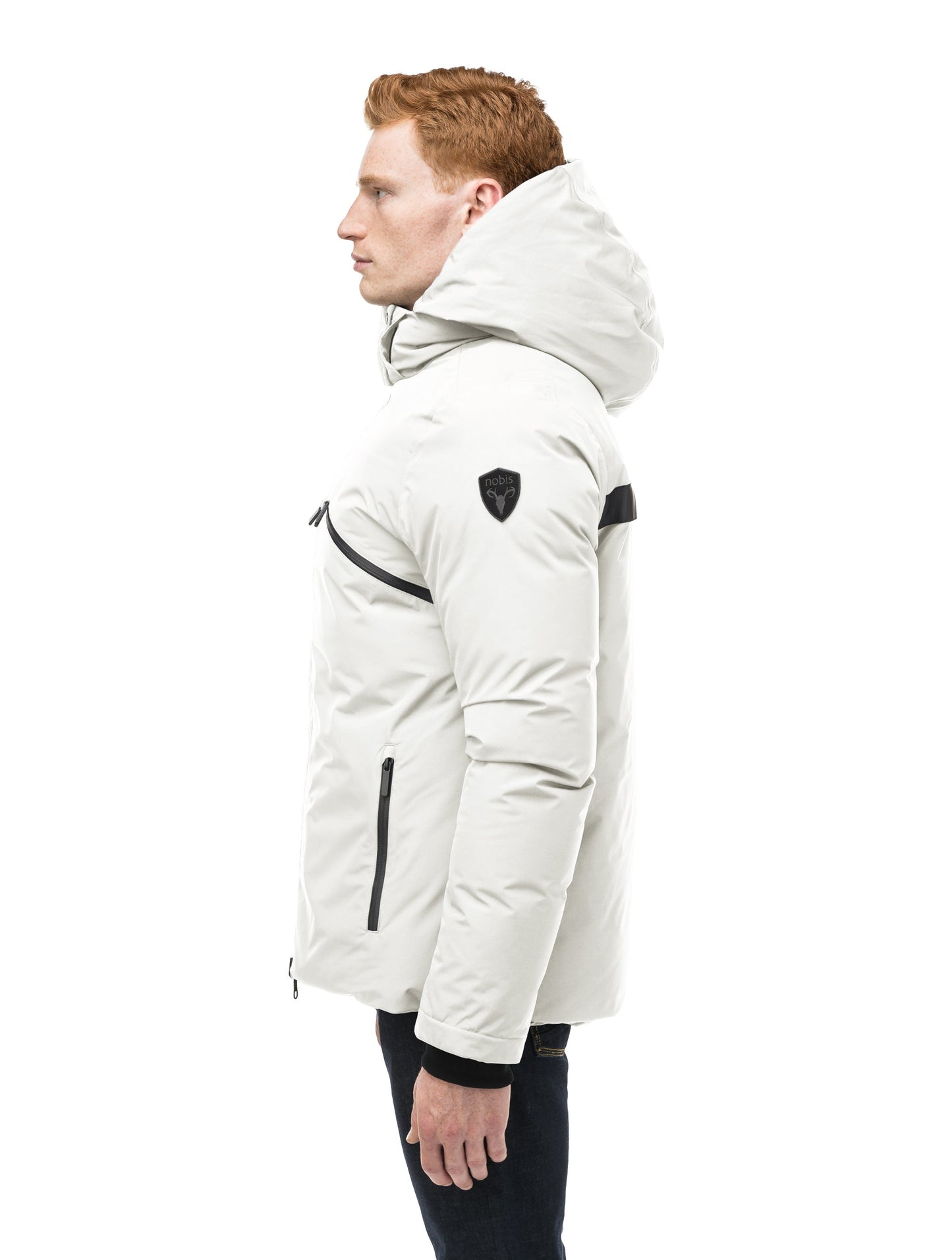 Hip length, reversible men's down filled jacket with removable hood in Chalk/Atomic