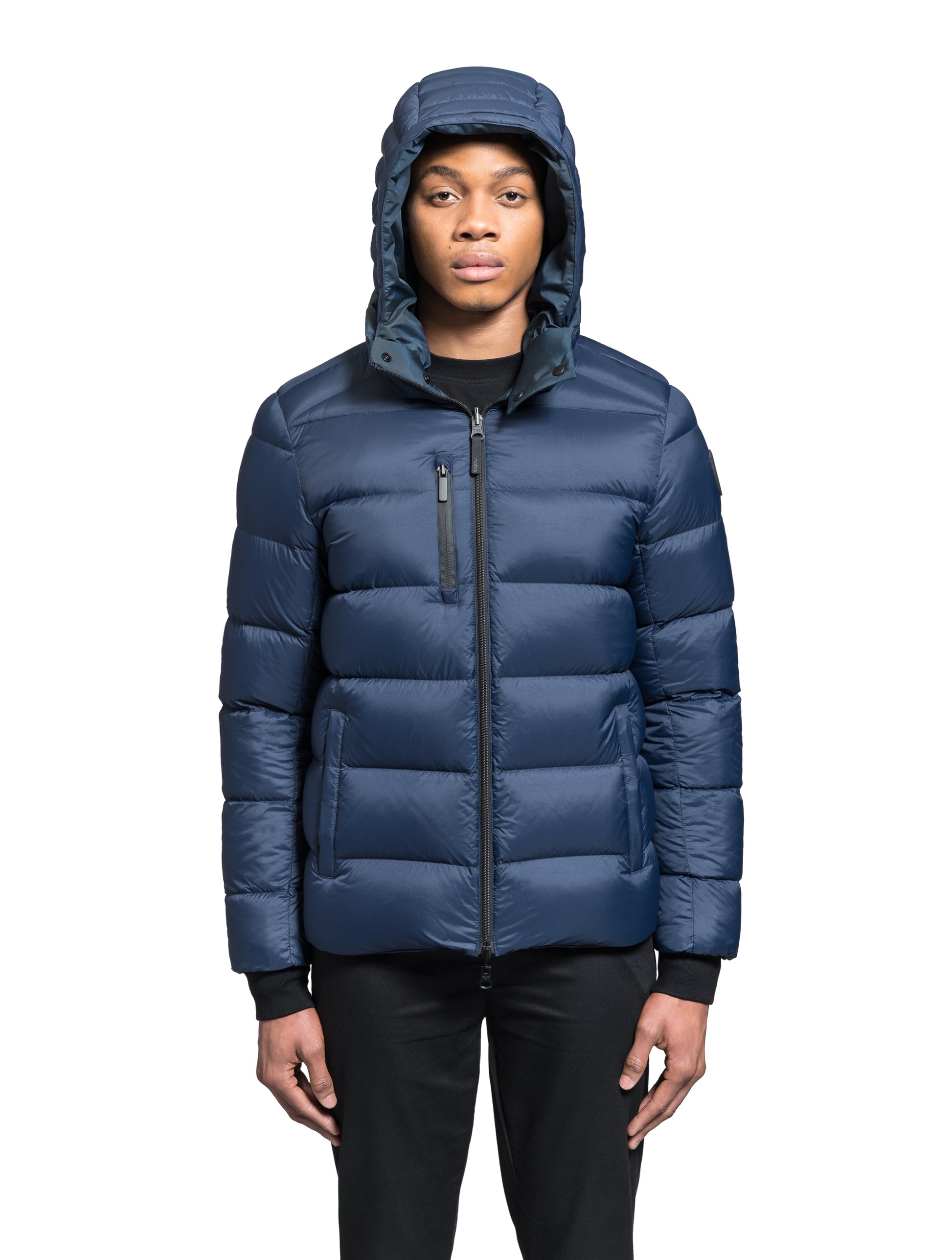 Hip length, reversible men's down filled jacket with removable hood in Navy Camo