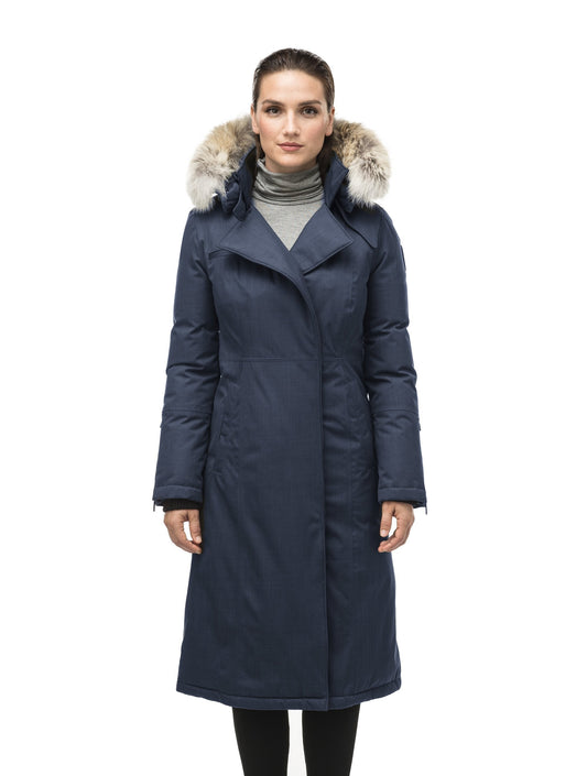 Long calf length women's trench inspired parka with removable fur trim around the hood and an asymetric closure in Navy + Navy