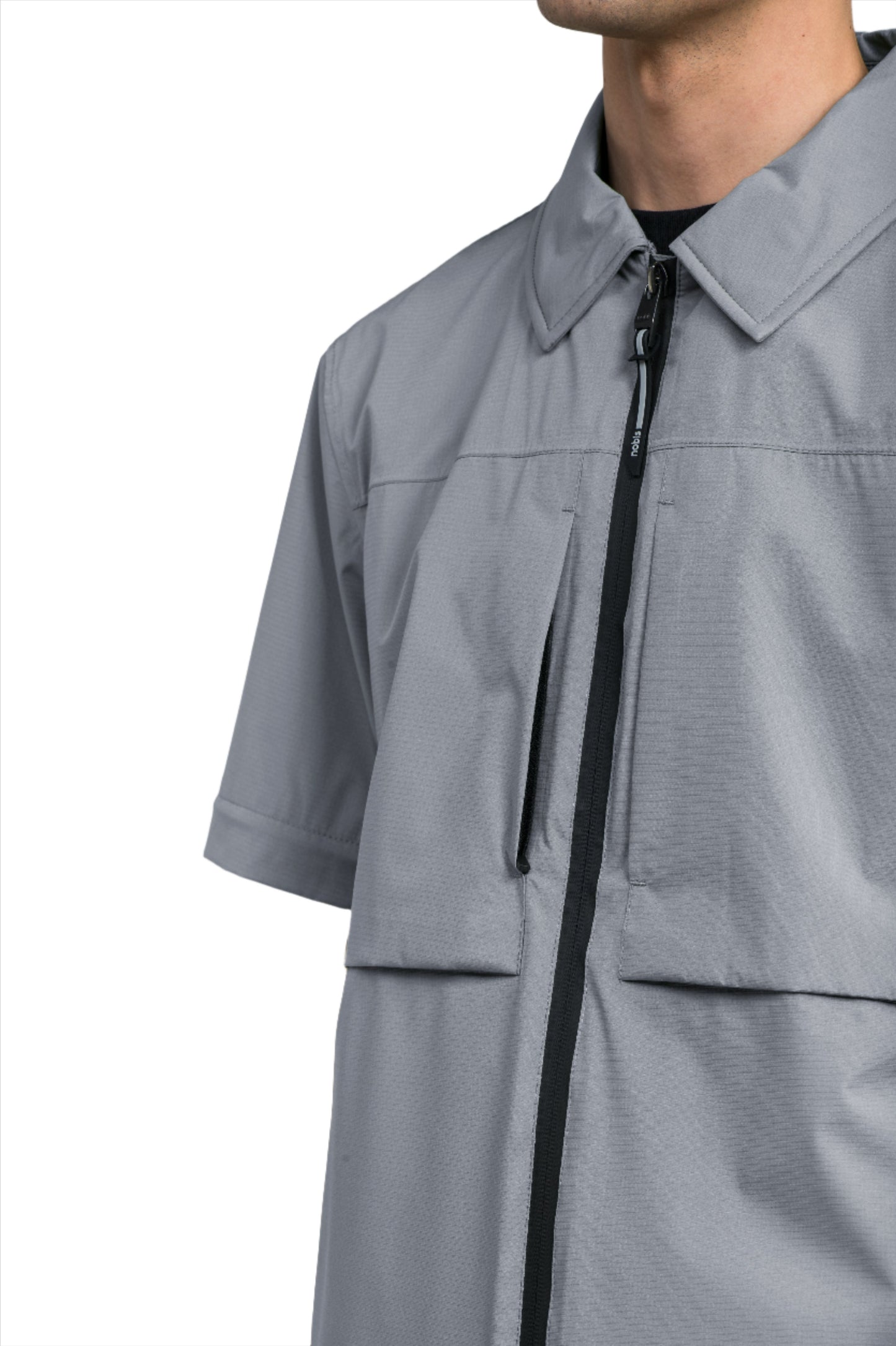 Thurlow Men's Performance Zip Off Sleeve Rain Shirt in hip length, convertible collar, patch chest zipper pockets, hidden in-seam pockets, zip off sleeves, centre front two-way zipper closure, in Concrete