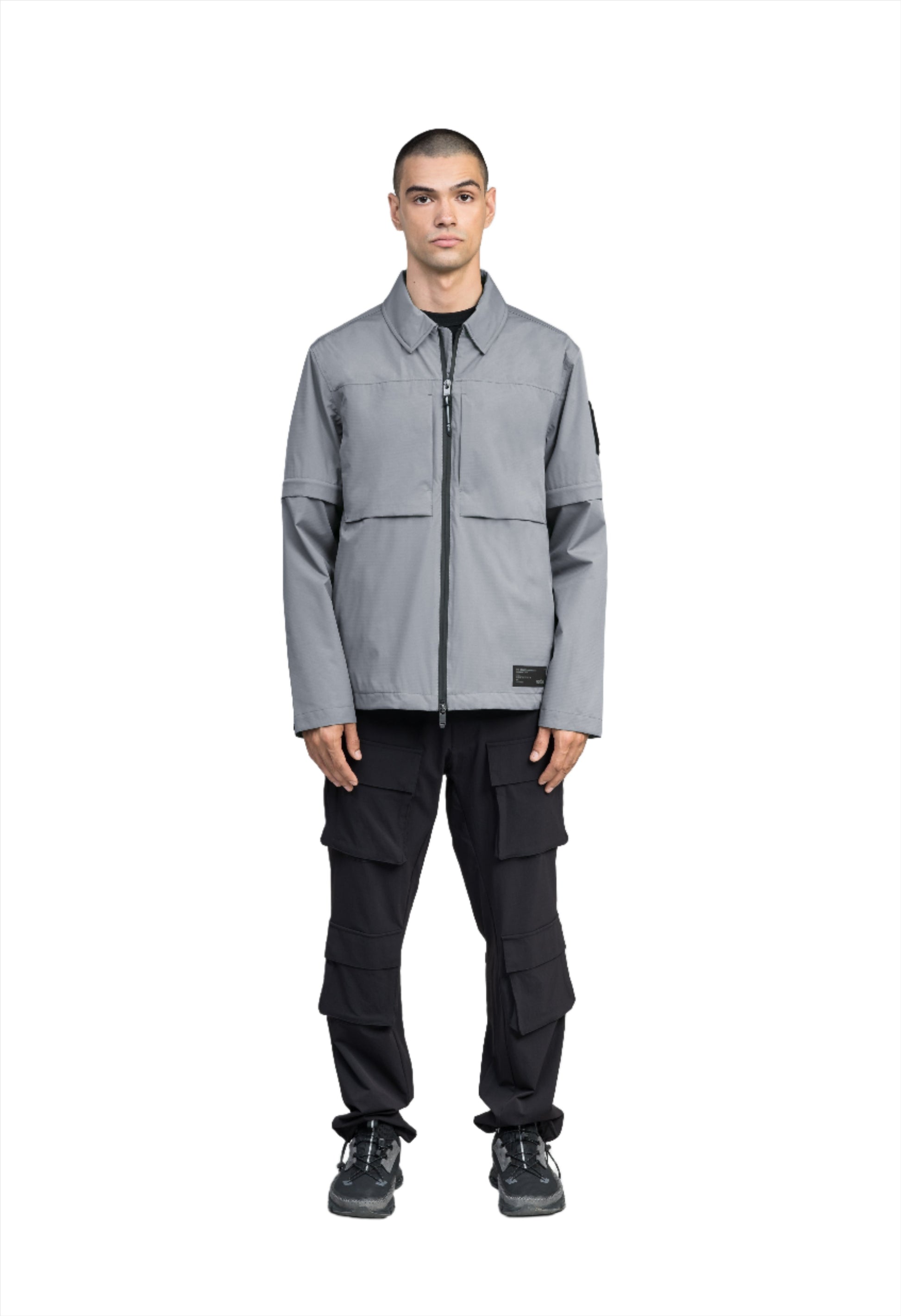 Thurlow Men's Performance Zip Off Sleeve Rain Shirt in hip length, convertible collar, patch chest zipper pockets, hidden in-seam pockets, zip off sleeves, centre front two-way zipper closure, in Concrete