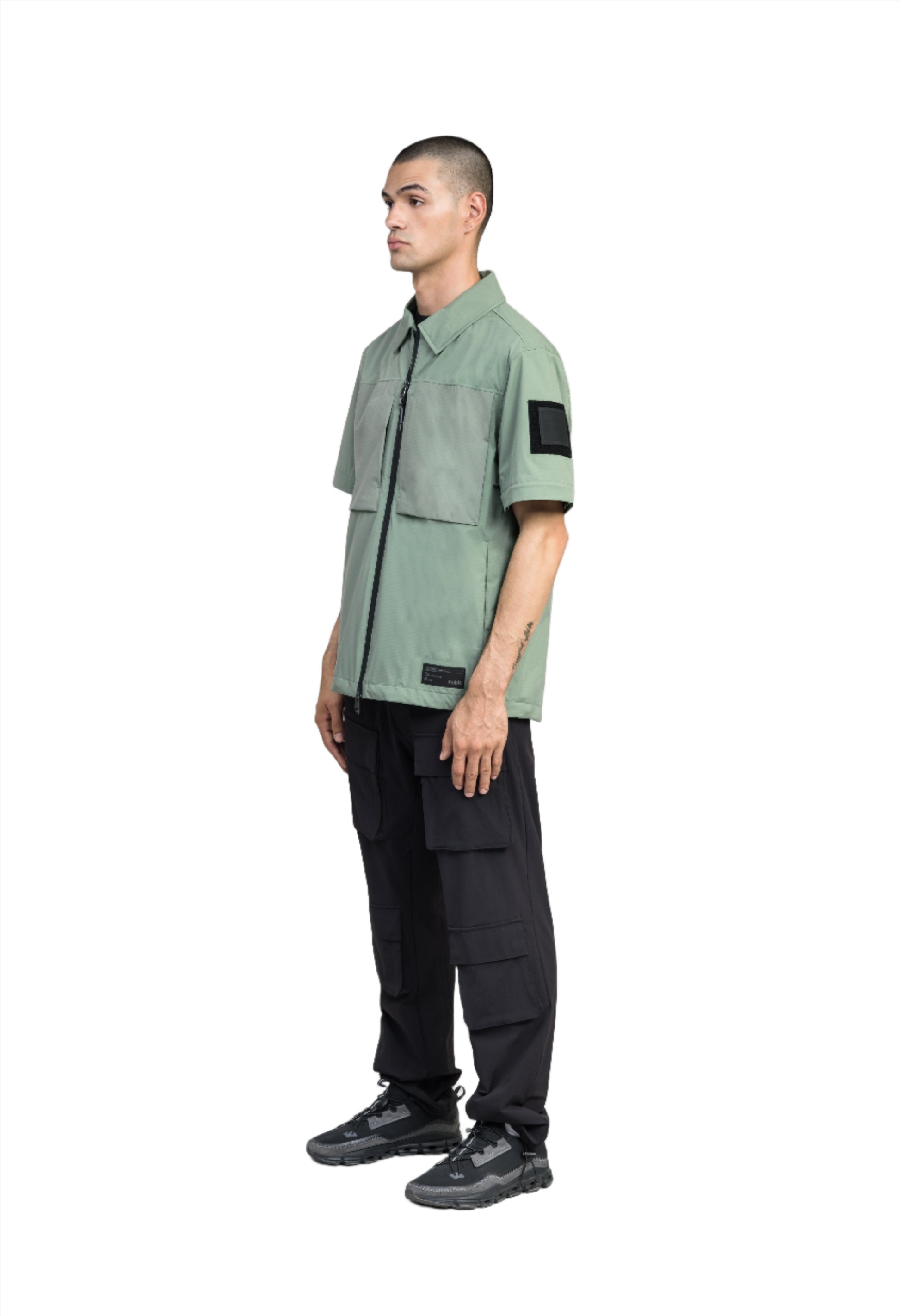 Thurlow Men's Performance Zip Off Sleeve Rain Shirt in hip length, convertible collar, patch chest zipper pockets, hidden in-seam pockets, zip off sleeves, centre front two-way zipper closure, in Duck Green