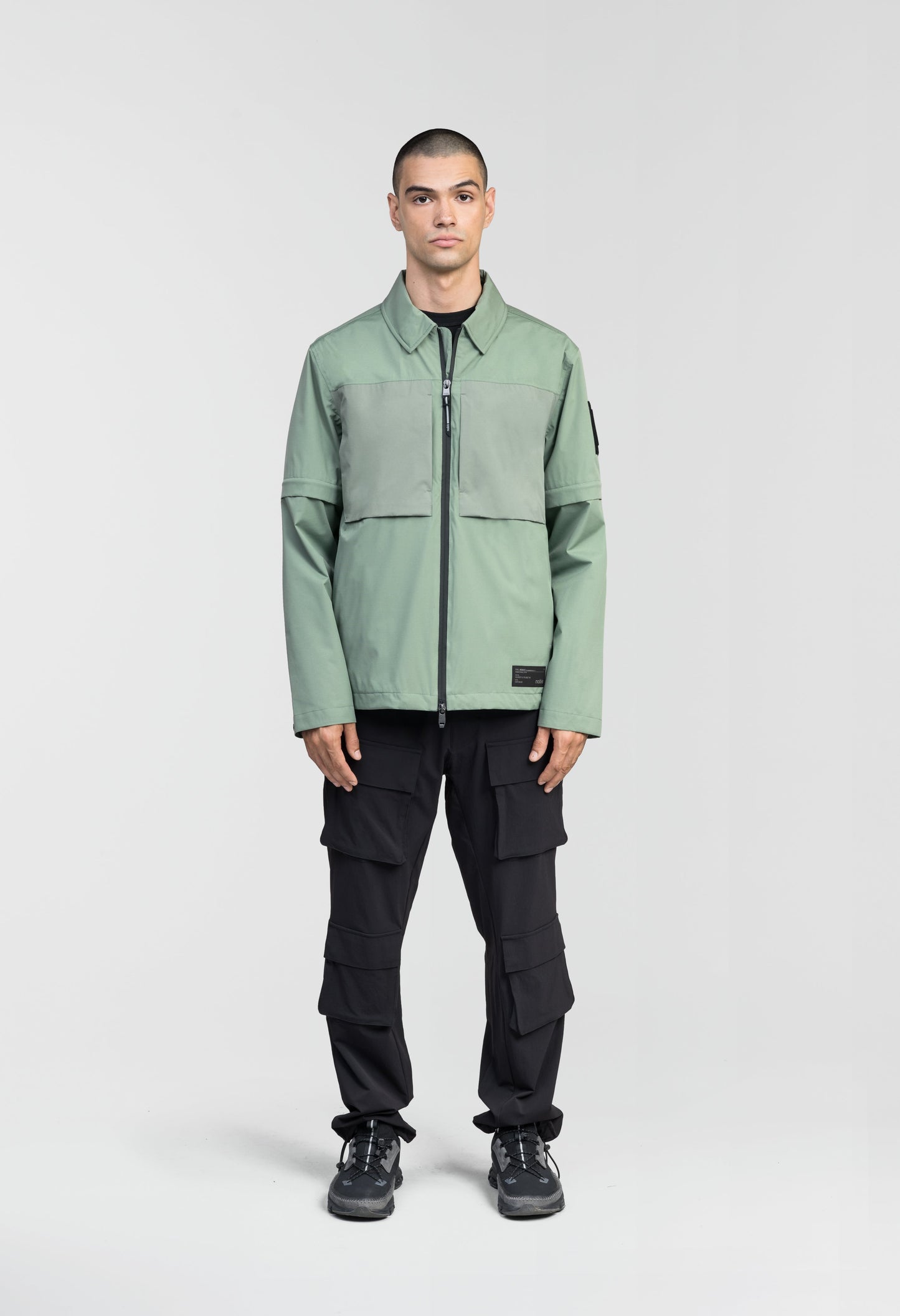 Thurlow Men's Performance Zip Off Sleeve Rain Shirt in hip length, convertible collar, patch chest zipper pockets, hidden in-seam pockets, zip off sleeves, centre front two-way zipper closure, in Duck Green