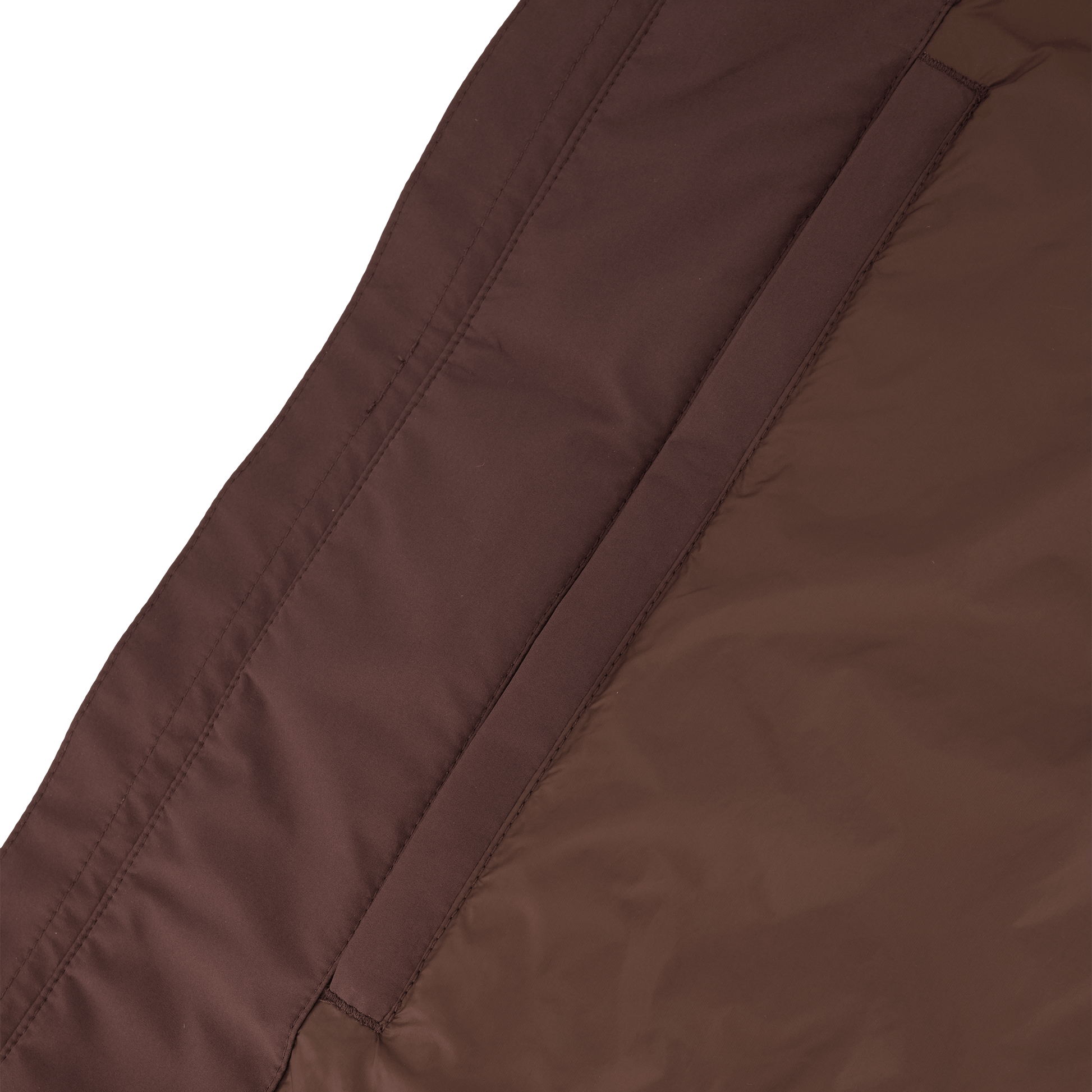 Upton long jacket in Coffee Bean in 3-ply Micro Denier fabric with DWR coating, featuring a two-way zipper with magnetic closure, hidden mesh ventilation, and underarm vents. Designed for weather protection and tailored comfort.