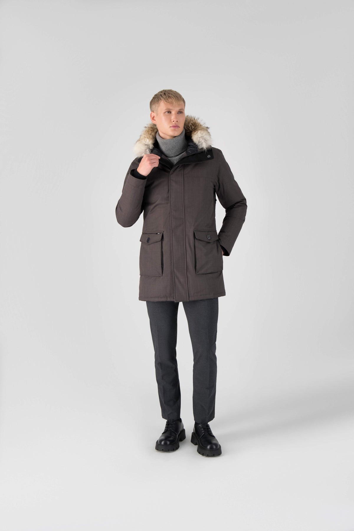 Men's slim fitting waist length parka with removable fur trim on the hood and two waist patch pockets in Steel Grey