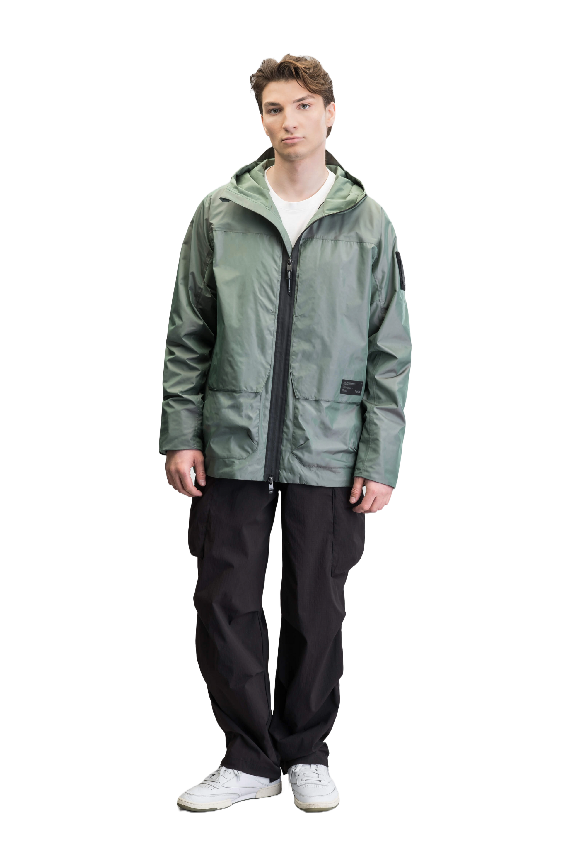 Mission Men's Performance Rain Shell Jacket in hip length, non-removable hood with adjustable toggle, two-way waterproof zipper, flap closure waist pockets with additional side entry storage, zipper ventilation on back, passive underarm ventilation, and breathable mesh lining, in Duck Green