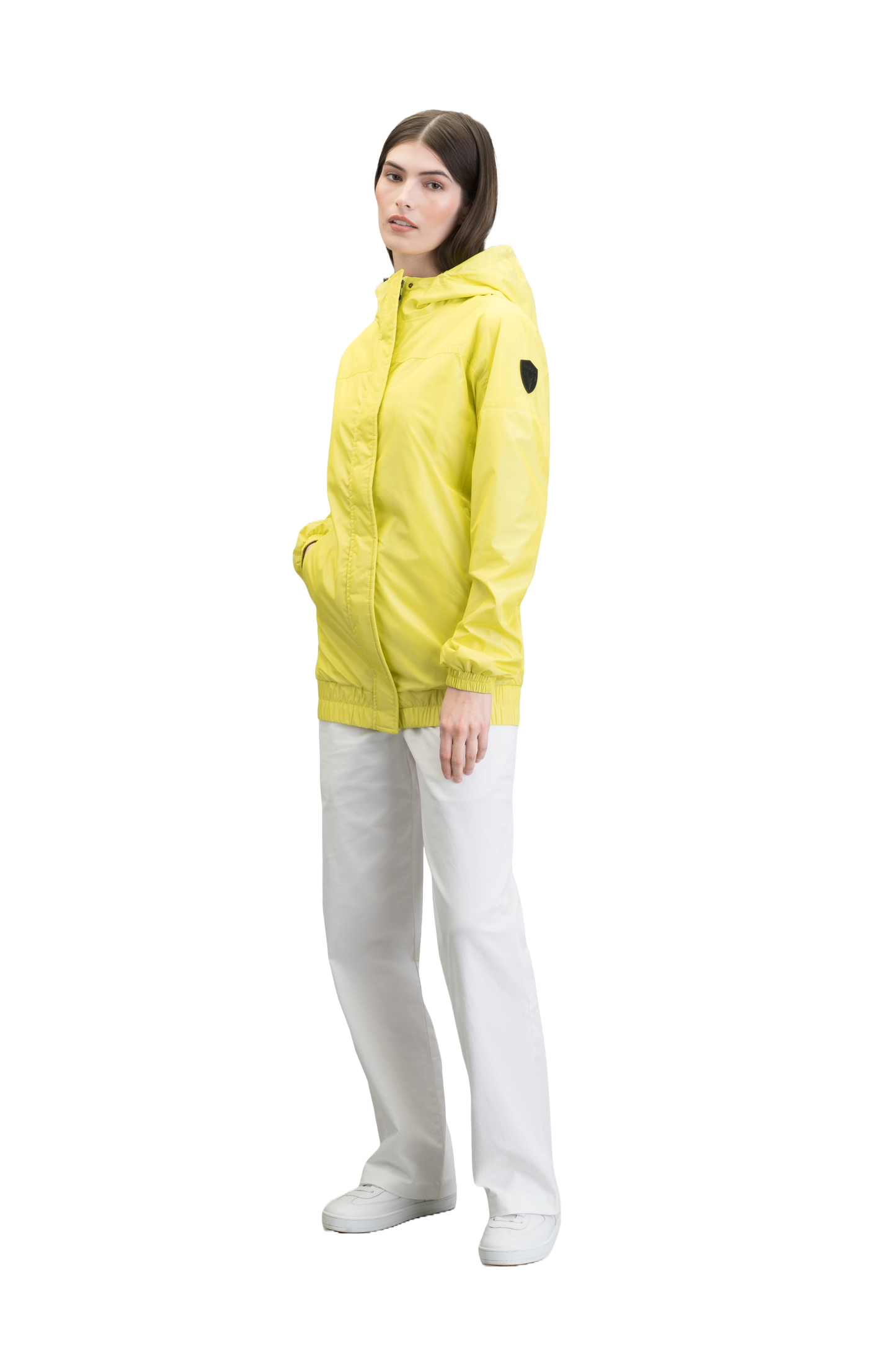 Hartley Women's Tailored Rain Jacket in hip length, two-way centre front zipper with wind flap, toggle adjustable cuffs and waist cord, non-removable hood, side entry waist pockets, in Sulphur Spring