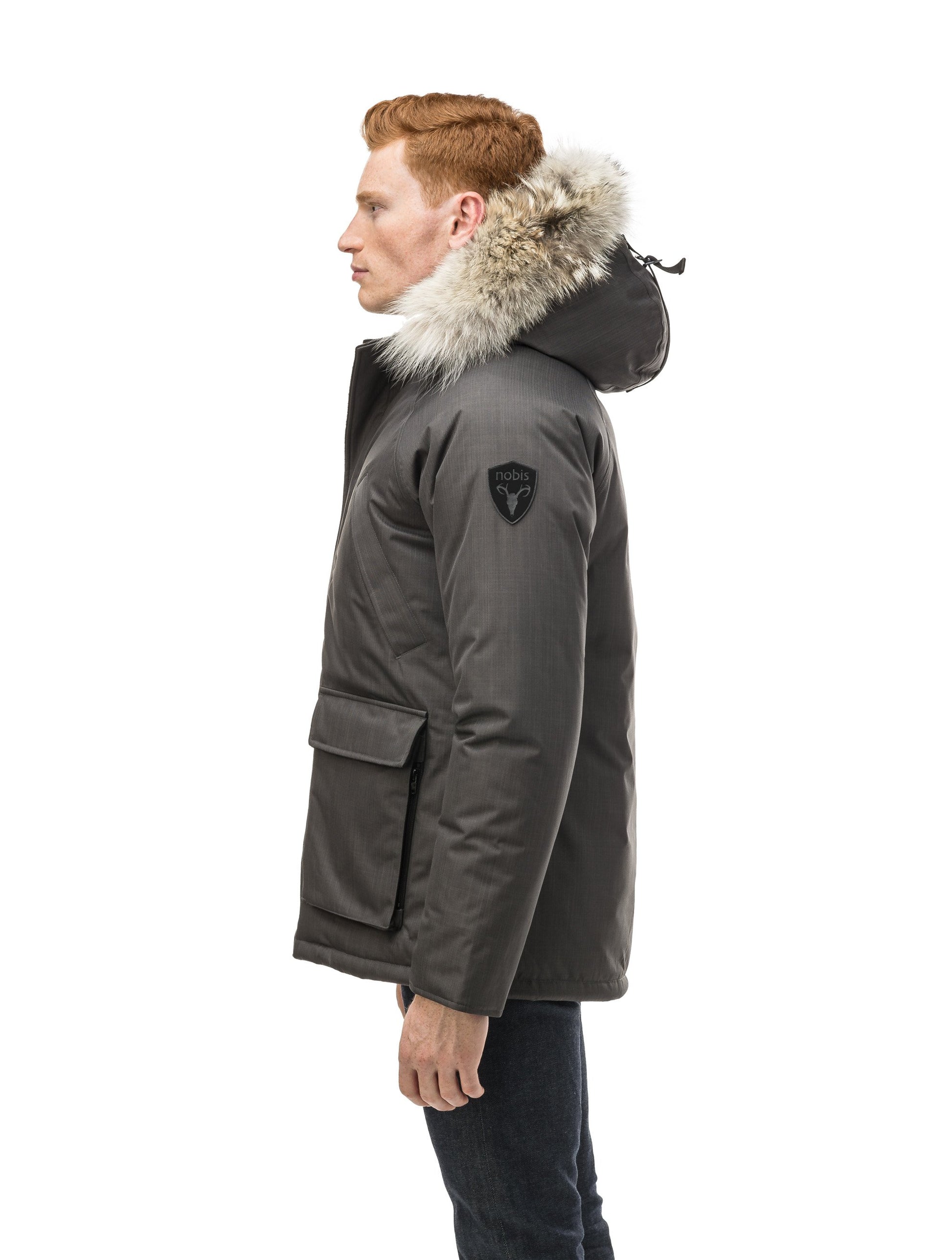 Men's waist length down filled jacket with two front pockets with magnetic closure and a removable fur trim on the hood in CH Steel Grey