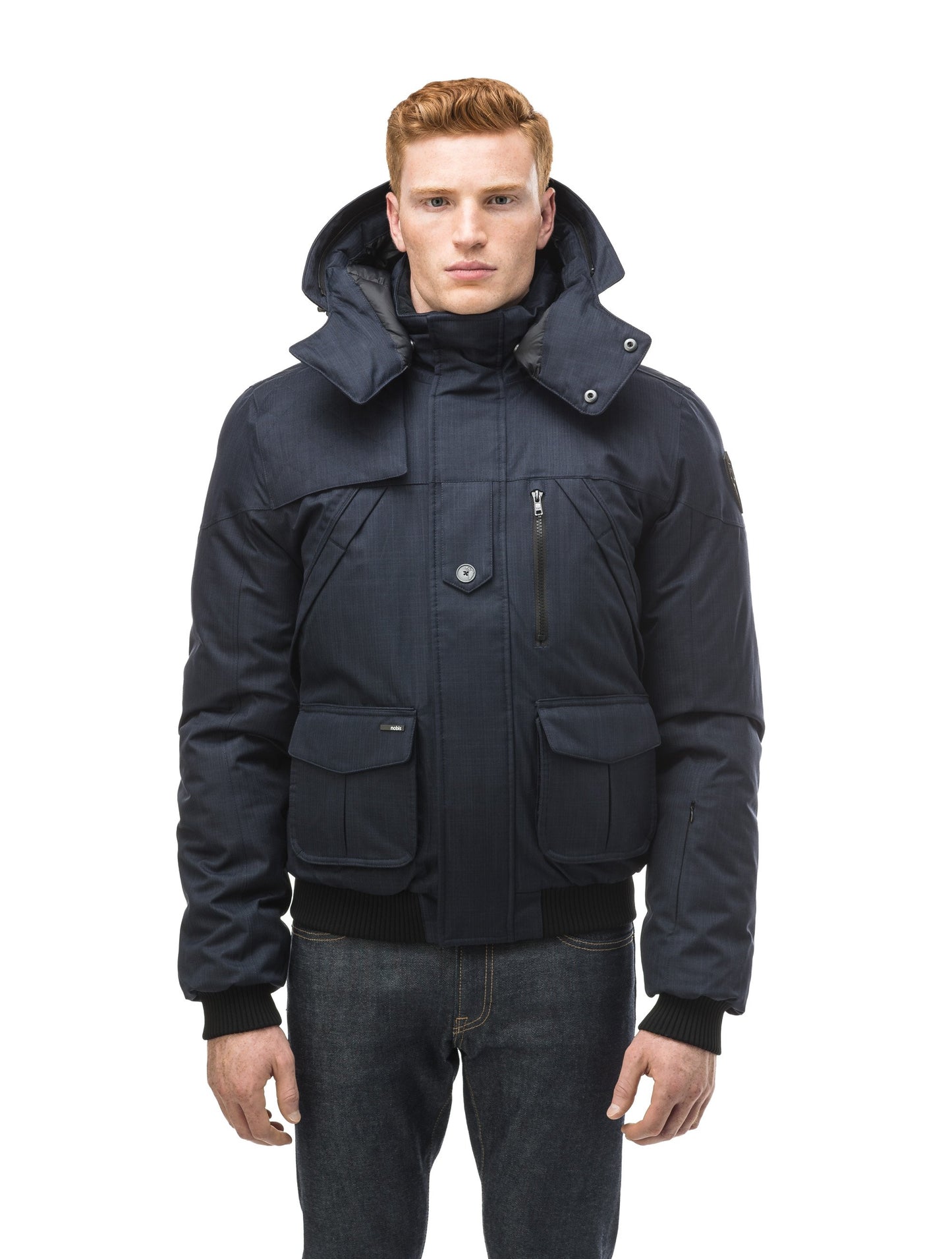 Men's classic down bomber with two patch pockets and a right shoulder storm flap in CH Navy