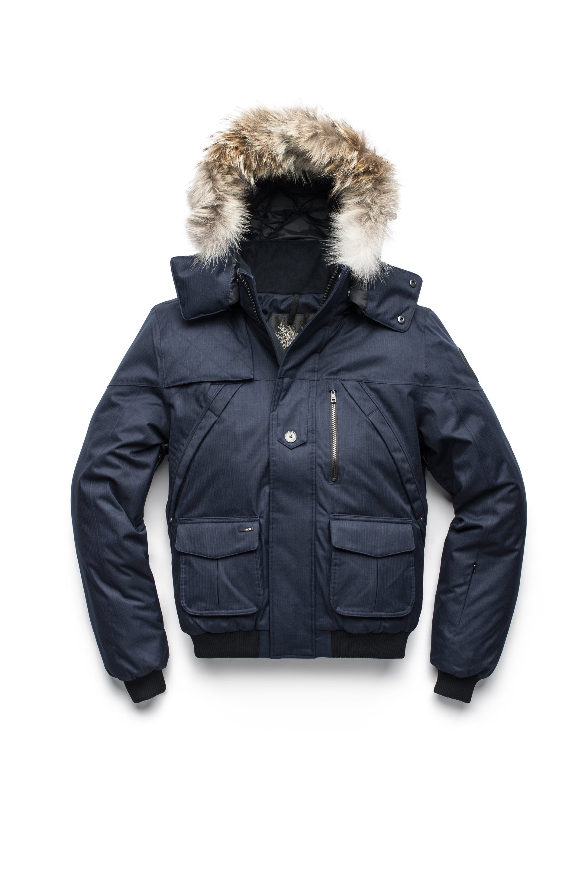 Men's classic down bomber with two patch pockets and a right shoulder storm flap in CH Navy