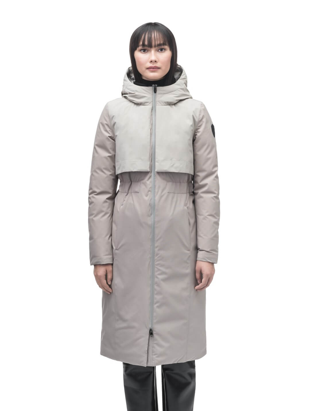 Iris Ladies Long Parka in below the knee length, Canadian duck down insulation, non-removable hood, and two-way zipper, in Clay