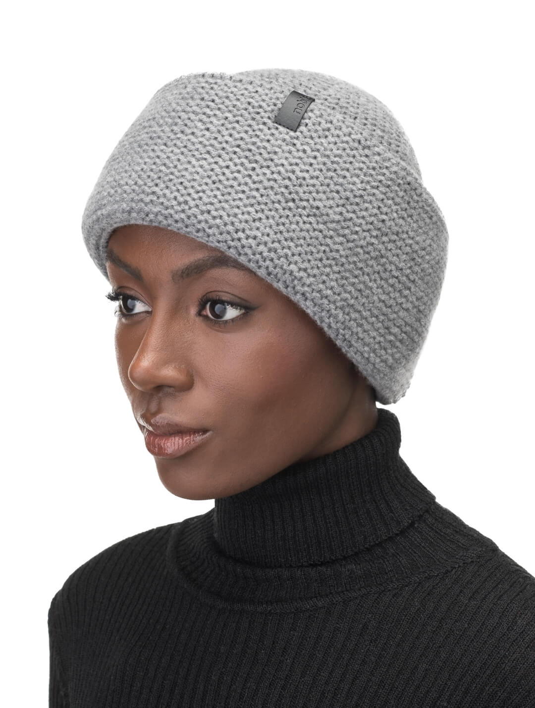 Mira Unisex Purl Knit Beanie in superfine merino wool and cashmere, and Nobis leather label at cuff, in Storm