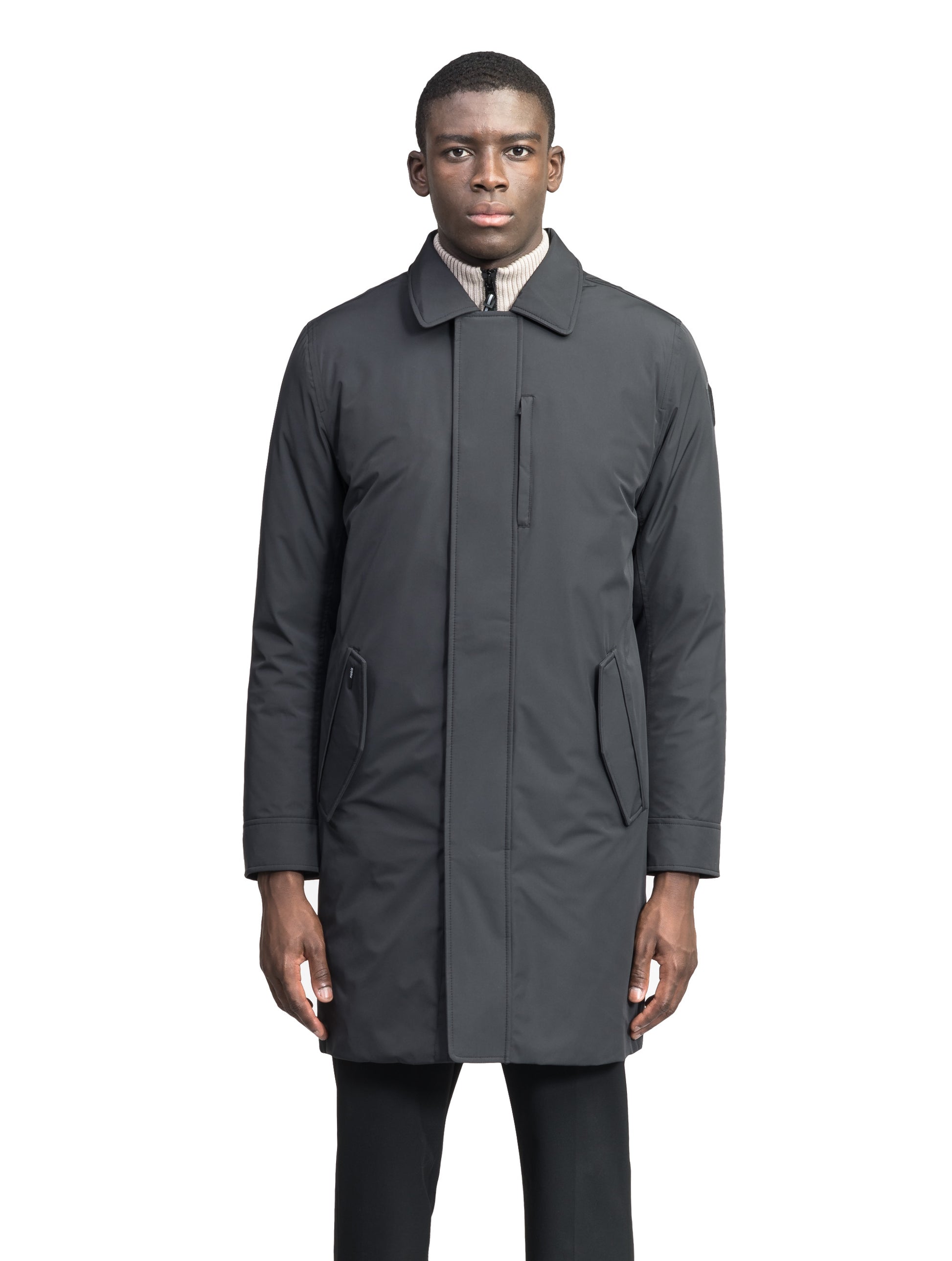 Nord Men's Tailored Trench Coat in knee length, 3-Ply Micro Denier and 4-Way Durable Stretch Weave fabrication, Premium Canadian White Duck Down insulation, removable down-filled hood, exterior zipper pocket at left chest, and adjustable snap button cuffs, in Black