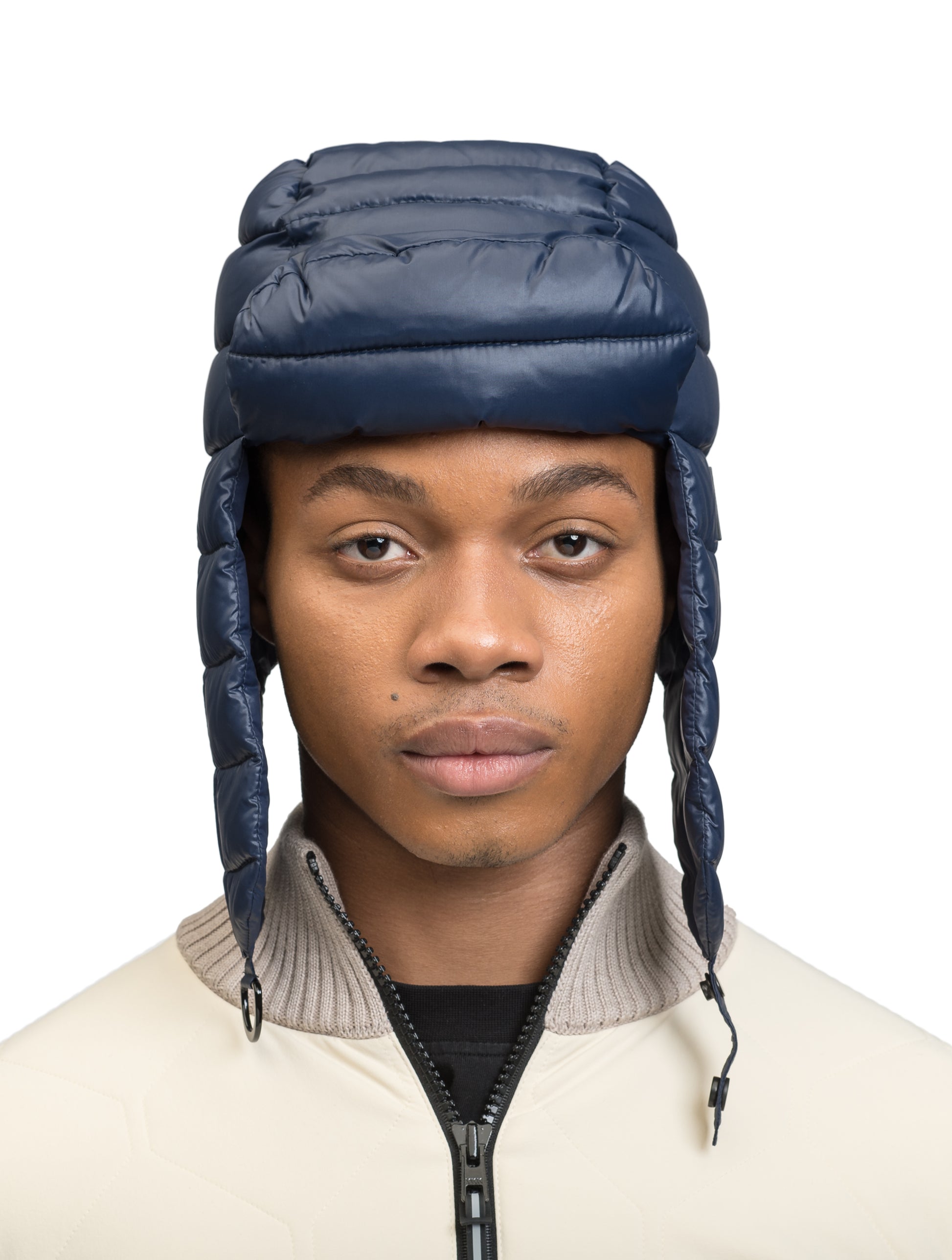 Unisex down-filled quilted fargo hat with adjustable chin strap in Marine