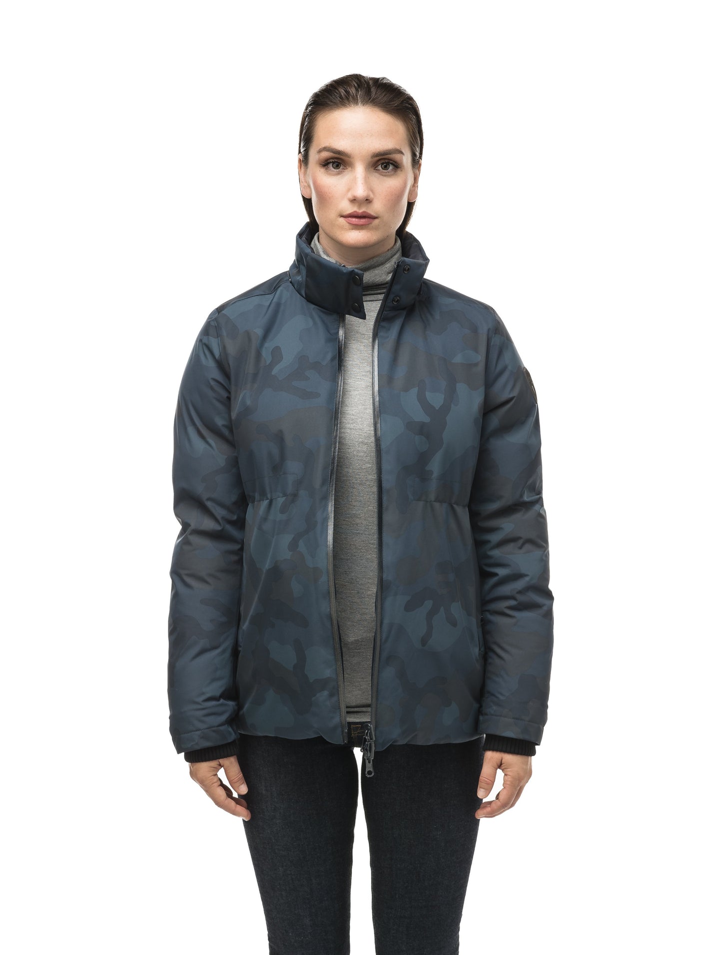 Hip length, reversible women's down filled jacket with waterproof exposed zipper in Navy Camo