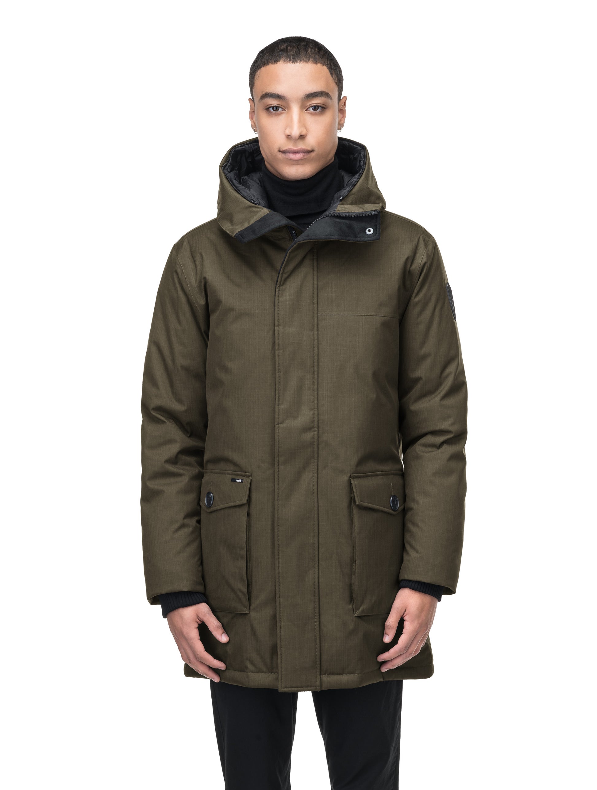 Yves Furless Men's Parka in thigh length, Canadian white duck down insulation, non-removable down-filled hood, flap pockets at waist, centre-front two-way zipper with magnetic wind flap, and elastic ribbed cuffs, in CH Fatigue