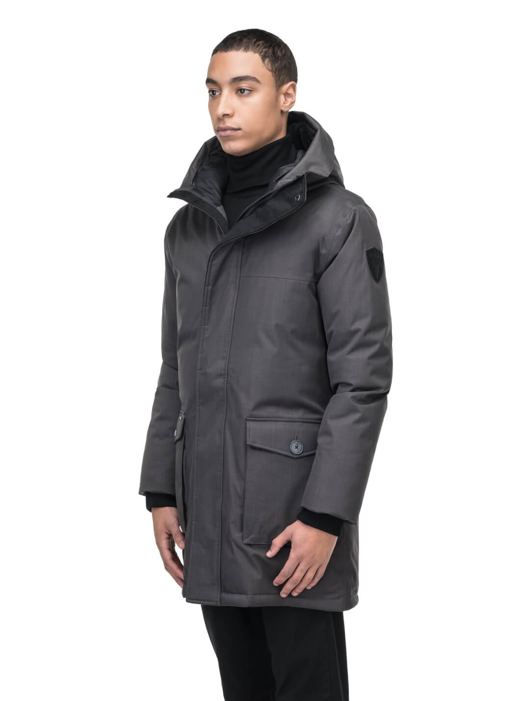 Yves Furless Men's Parka in thigh length, Canadian white duck down insulation, non-removable down-filled hood, flap pockets at waist, centre-front two-way zipper with magnetic wind flap, and elastic ribbed cuffs, in CH Steel Grey